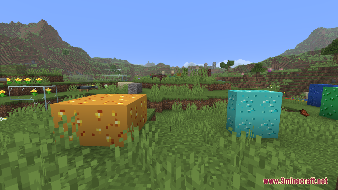 Glow Up – Emissive Ores Resource Pack (1.21.11, 1.20.1) – Makes Modded Ores Glow Brightly 11 Large glowing gold and diamond ore blocks in a grassy area
