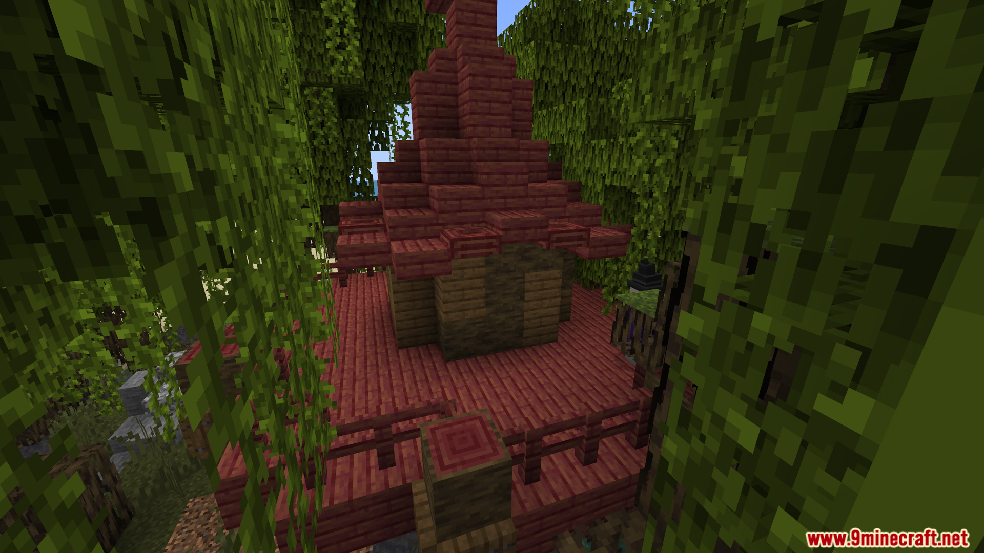 Jaki Versatile Structures Mod (1.20.1) – Adds New Vanilla Style Structures 10 Red mangrove wood hut structure surrounded by dense green swamp vegetation