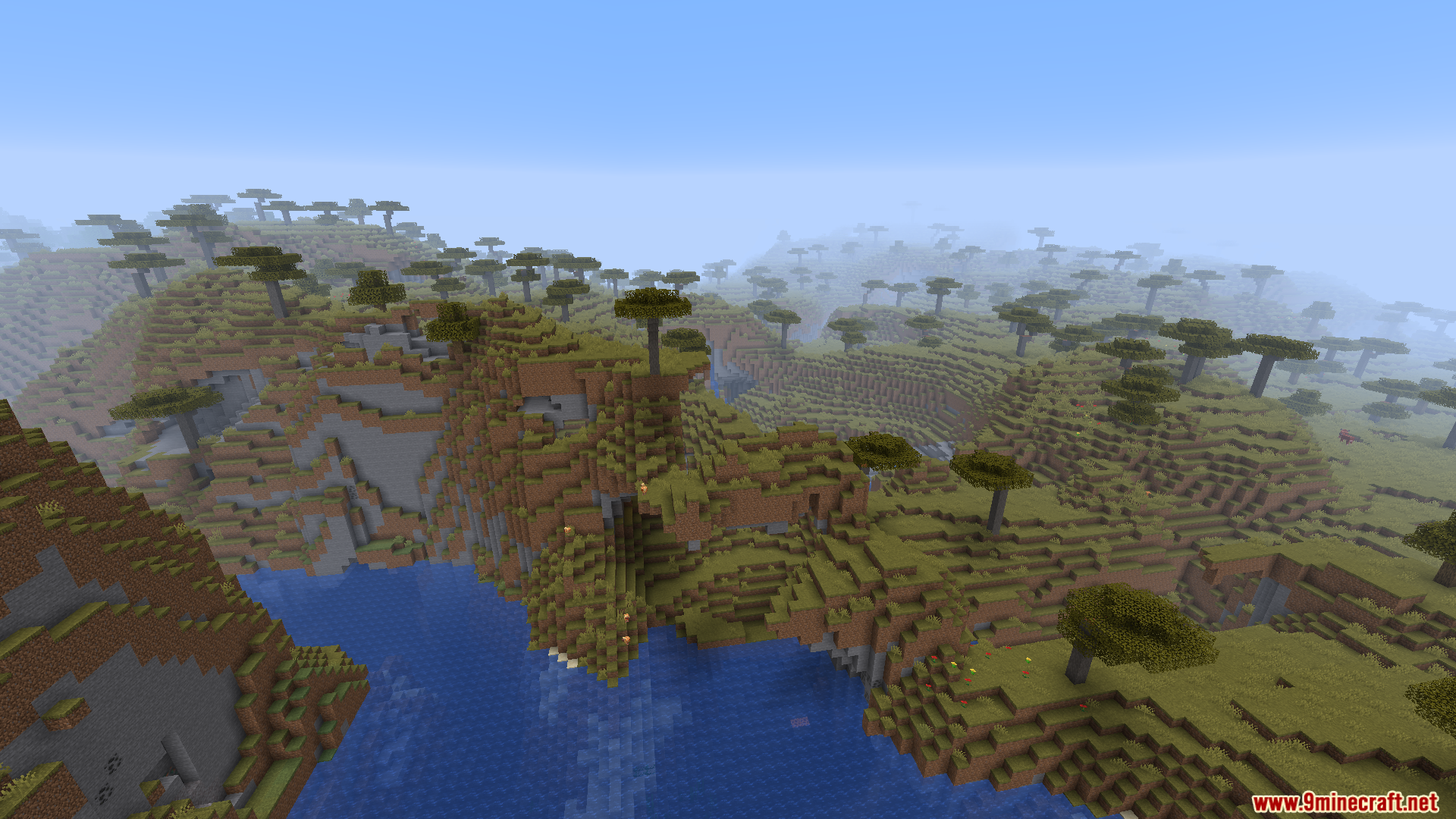 Worldweaver Neoforge Mod (1.21.11, 1.21.1) – Ports Worldweaver To Neoforge 5 Aerial view of savanna terrain with river and cliffs