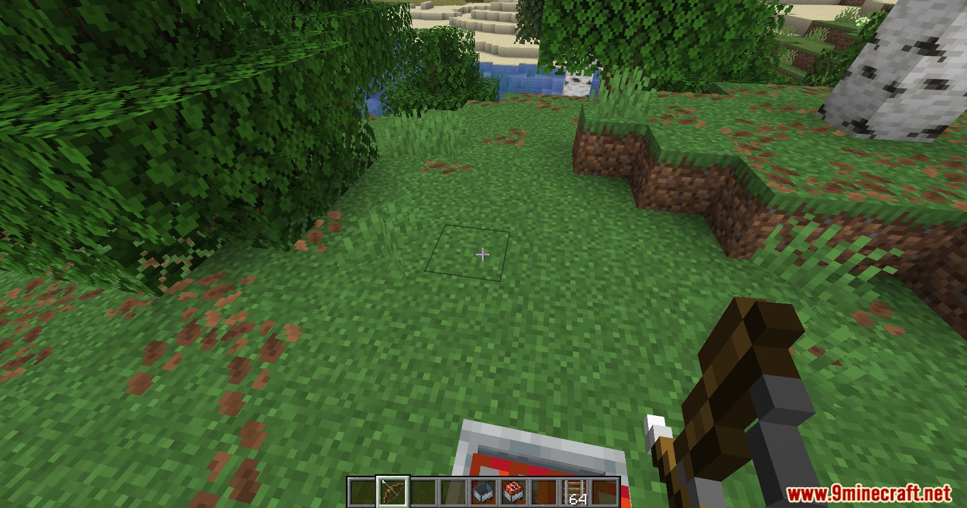 Auto Cart Mod (1.21.11) – Shoot Explosive Tnt Carts 6 Player holding a crossbow in a grassy area