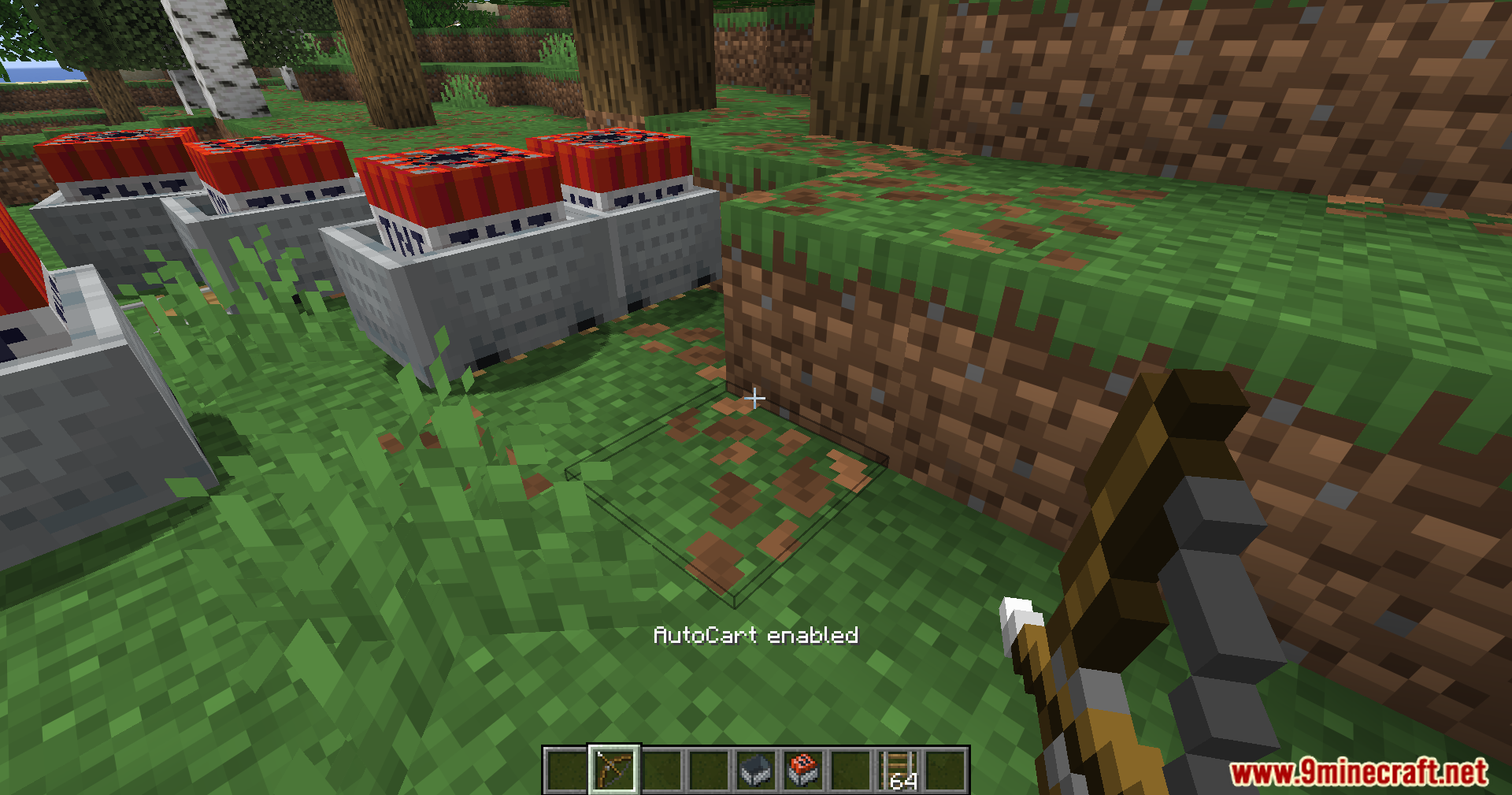 Auto Cart Mod (1.21.11) – Shoot Explosive Tnt Carts 10 Player aiming a bow near a row of tnt minecarts