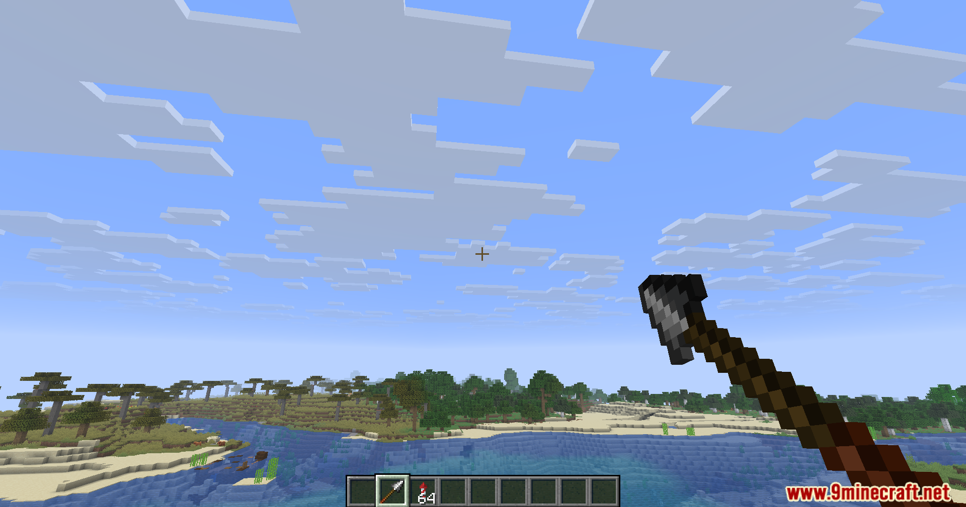 Player aiming a spear in a savanna biome