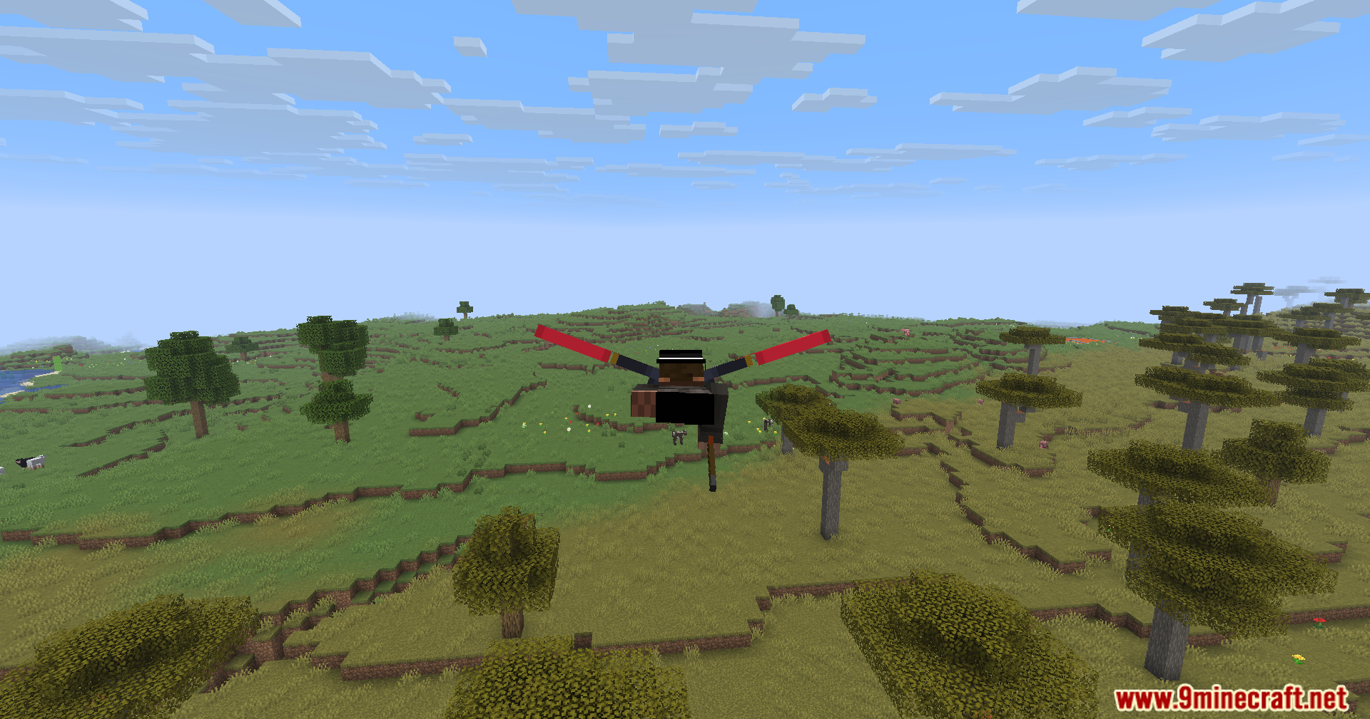 Player flying with an elytra over a savanna
