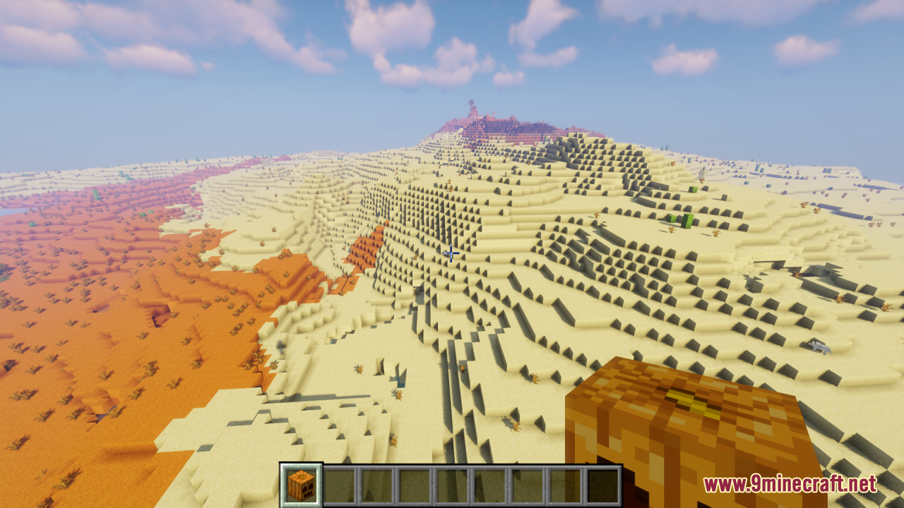 Cute Pumpkin Resource Pack – Friendly Smiles For Cozy Vanilla Farms 2 Player holding a smiling carved pumpkin in a desert biome