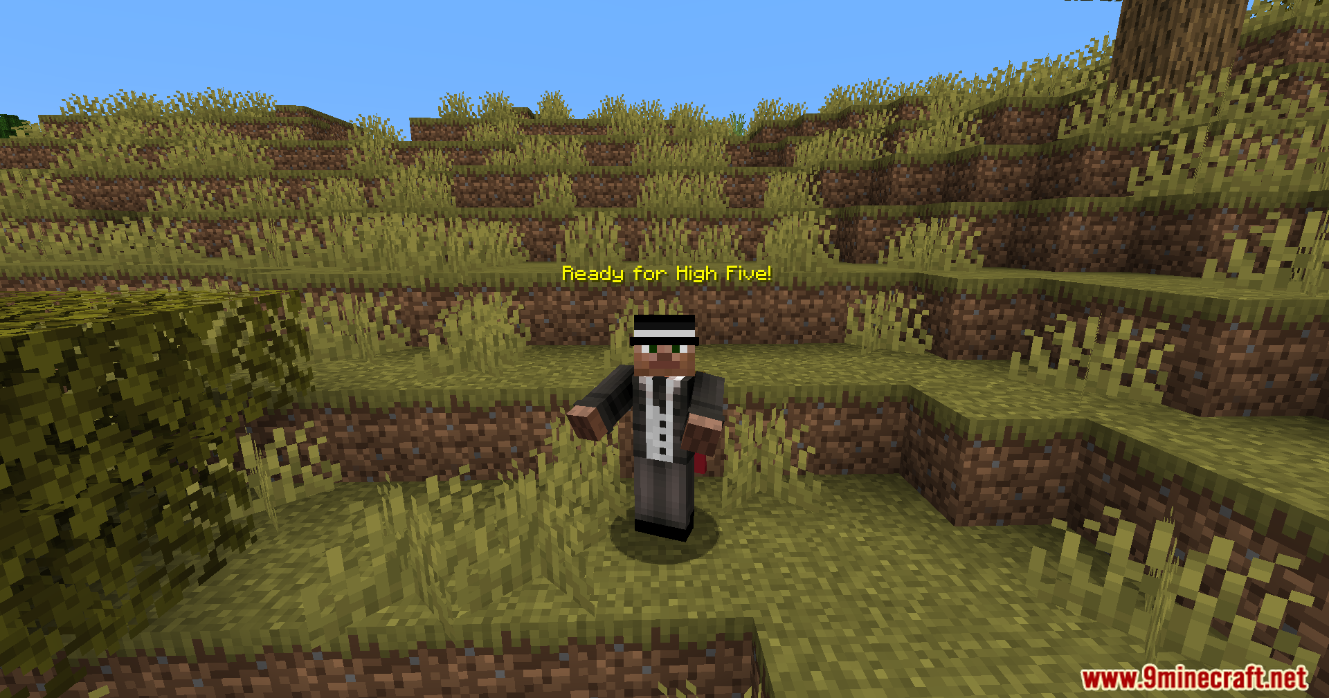 Minecraft player in a suit getting ready for a high five