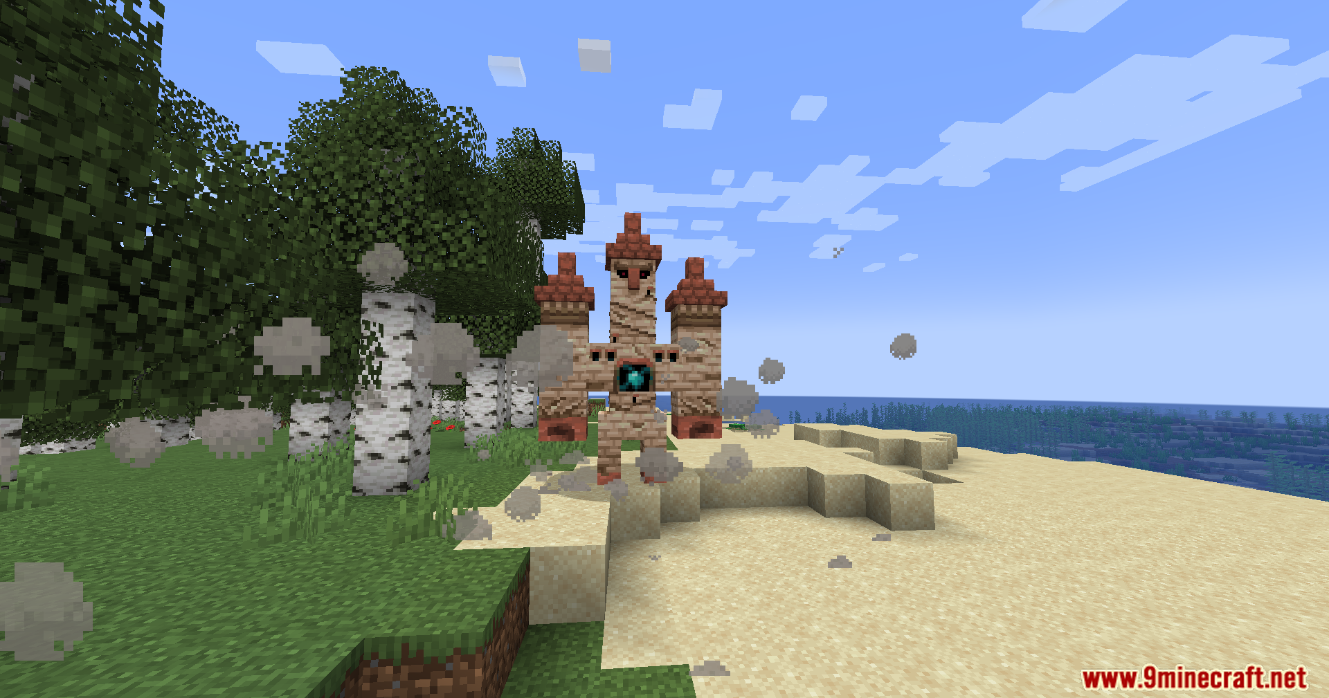 The sandstone golem stands on a beach, kicking up sand