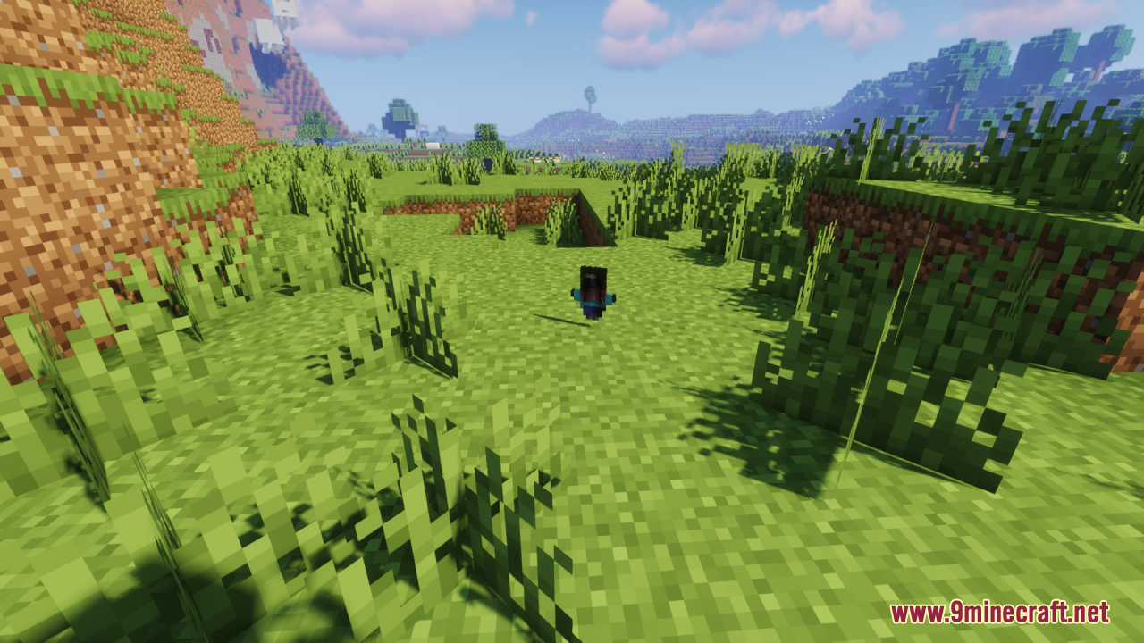 The creepy steve totem item floating above the ground in a grassy field