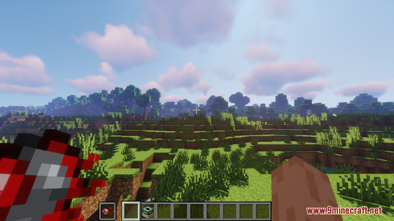 Mechanical Eye Resource Pack (1.20.1) – A Robotic Terraria Twist On End Portals 6 Player holding the custom mechanical eye item in a grassy landscape