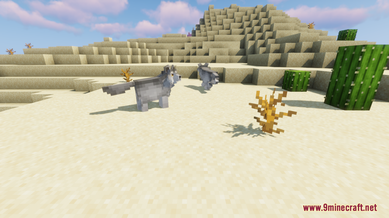 Two wolves wandering through a vast sandy desert biome