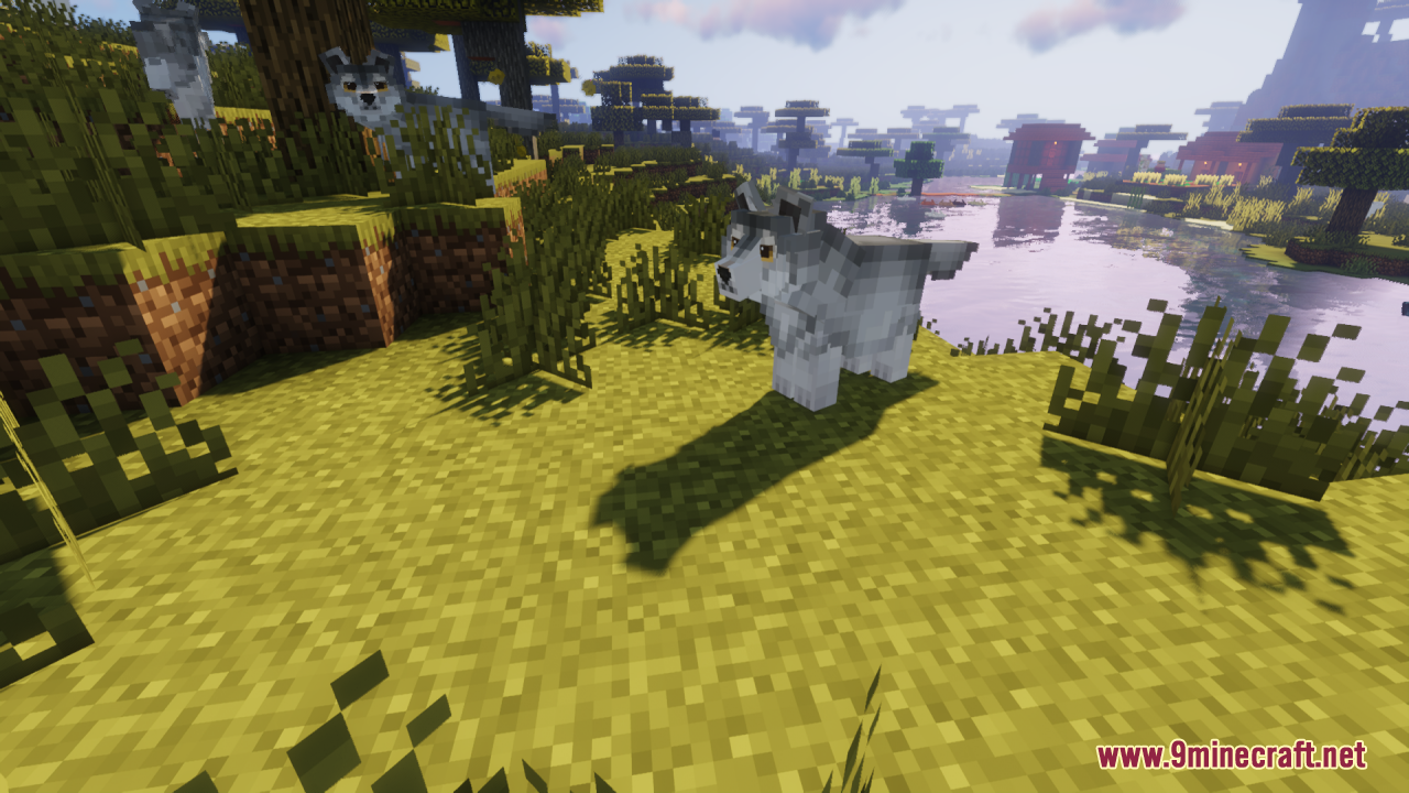 A detailed dog model standing in a grassy field