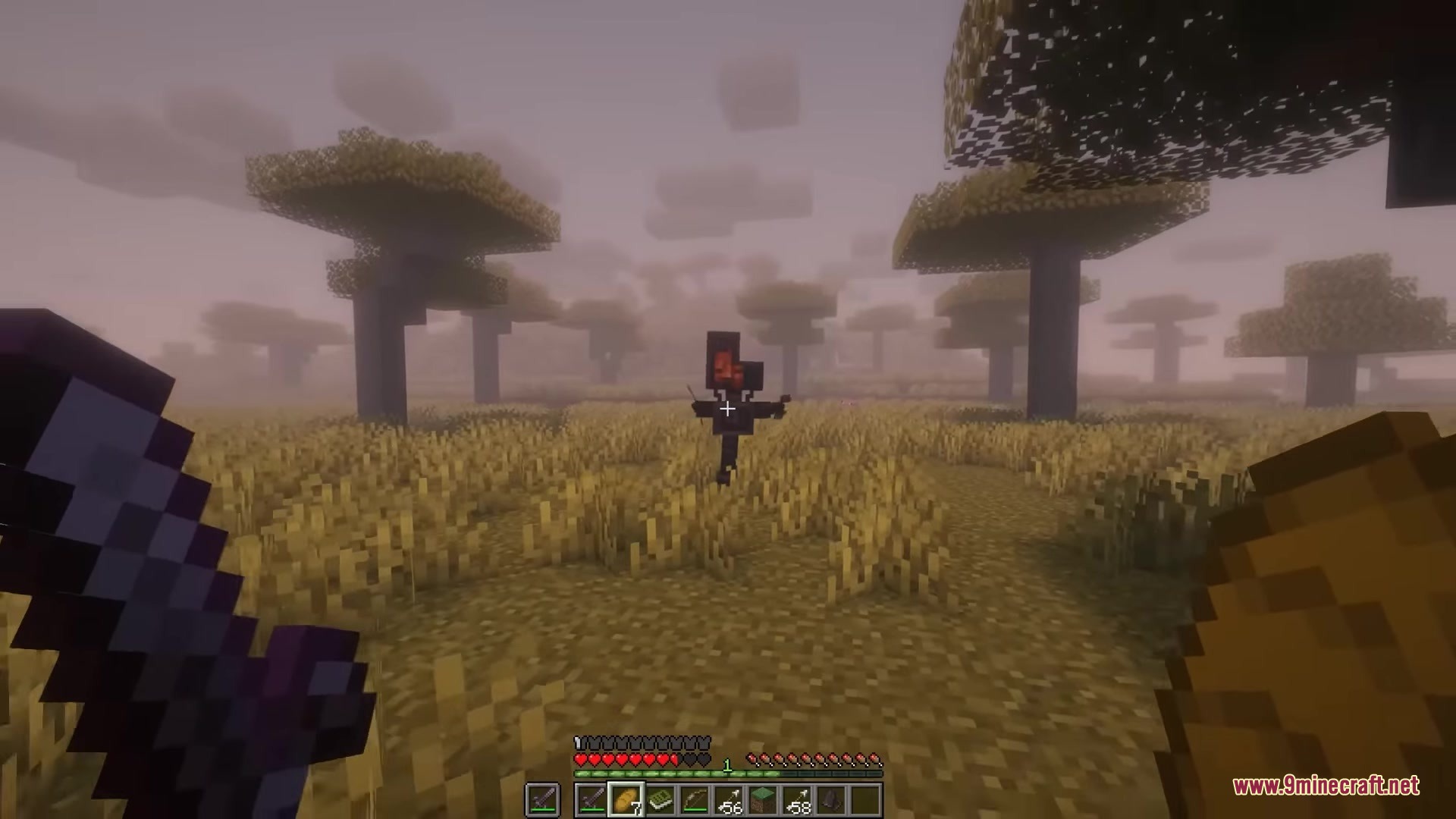 Kismet Mod (1.20.1) – Become A Powerful Cyborg By Hunting Robotic Invaders 14 A player spots a robotic enemy standing in a foggy savanna biome
