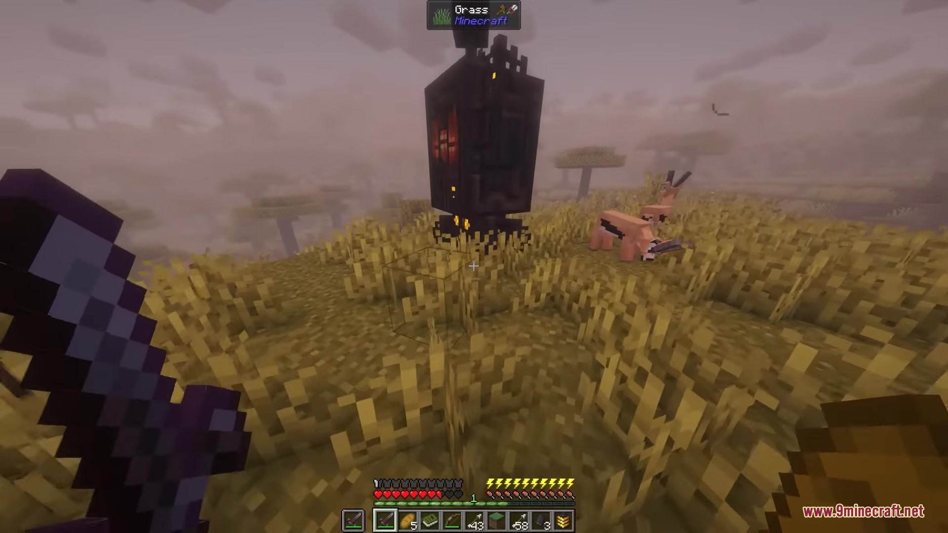 Kismet Mod (1.20.1) – Become A Powerful Cyborg By Hunting Robotic Invaders 16 Player holding a netherite sword encounters a giant mechanical robot in the savanna
