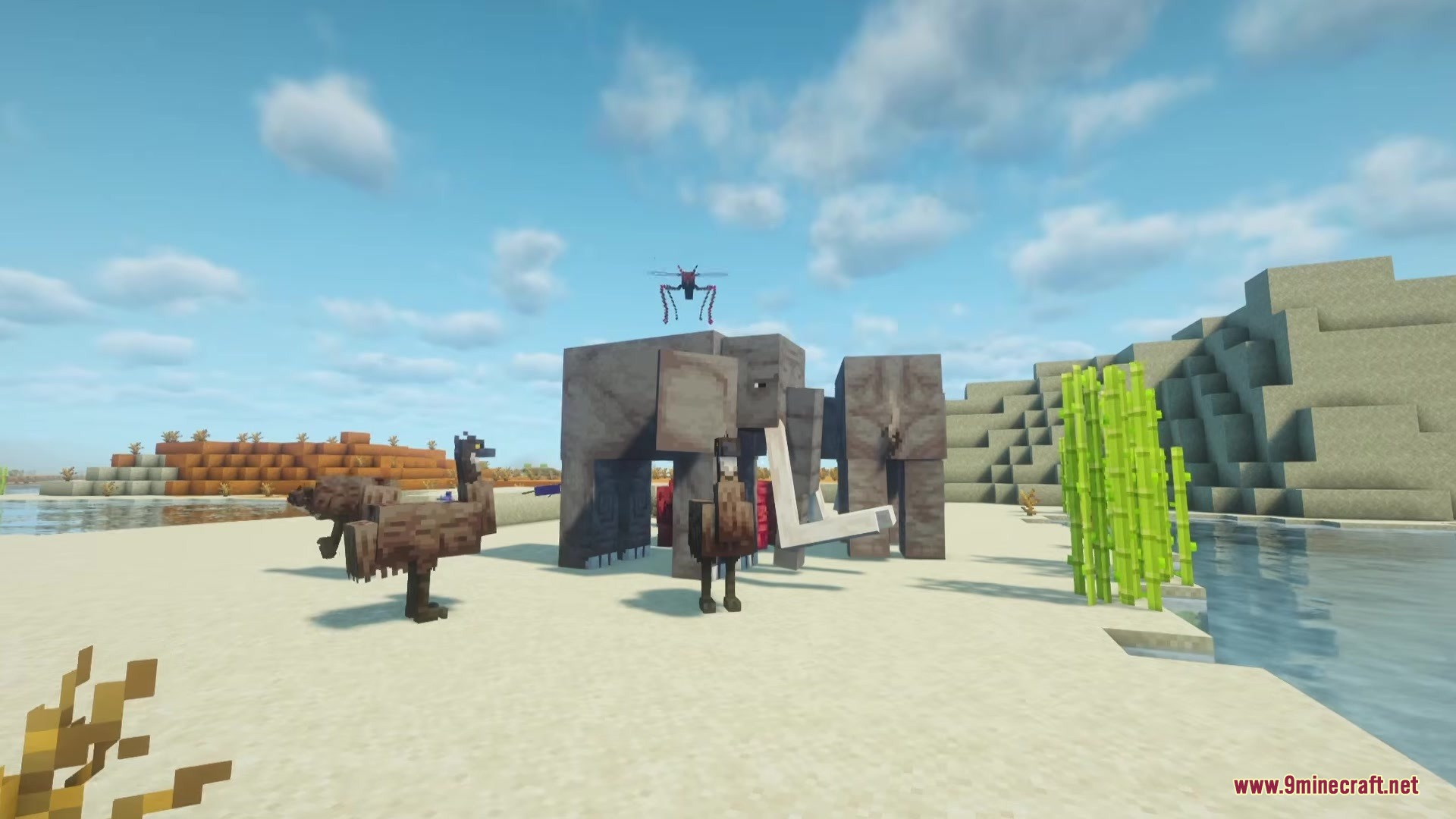 Alex’s Mobs Fabric Mod (26.2, 1.20.1) – Populate Every Biome With Exotic 7 Elephants and emus stand on a sandy beach with a mosquito flying above