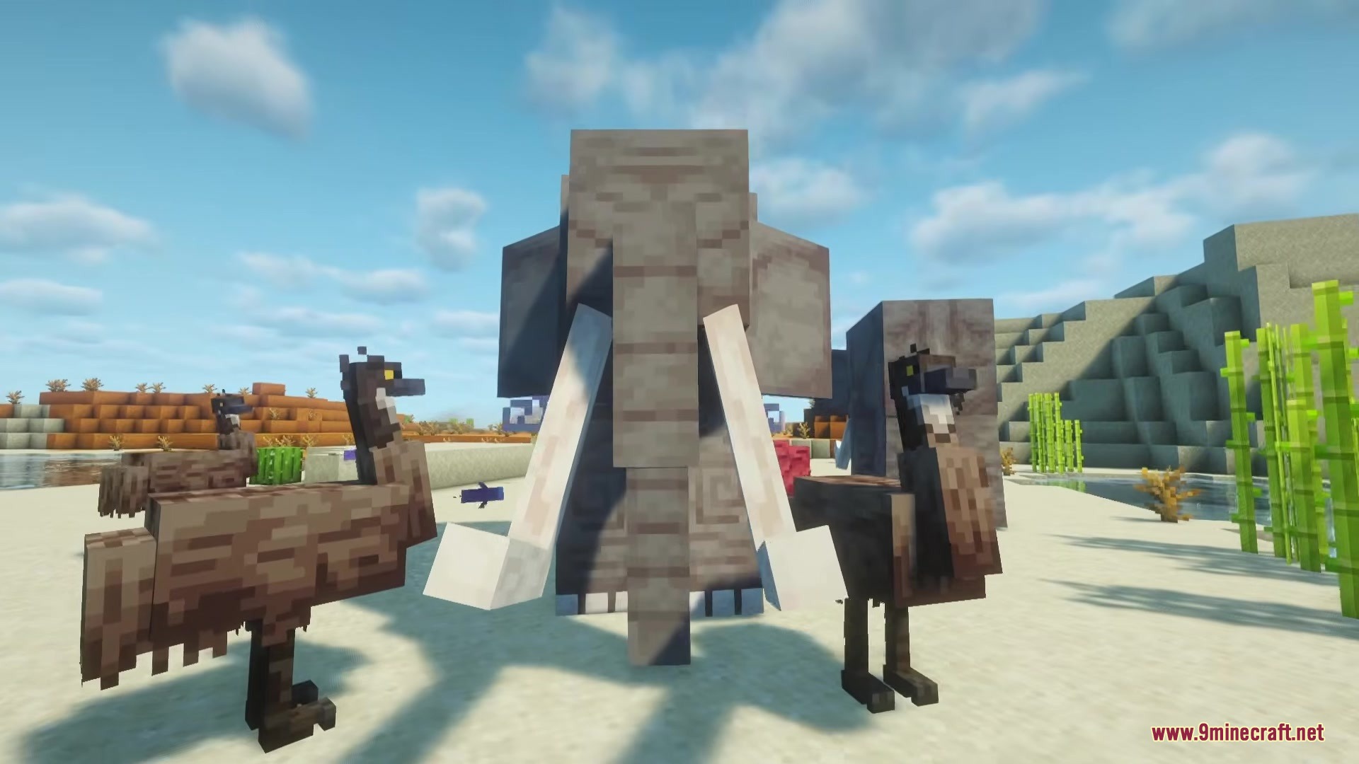 Alex’s Mobs Fabric Mod (26.2, 1.20.1) – Populate Every Biome With Exotic 8 A large mammoth stands between two emus in a sunny desert biome