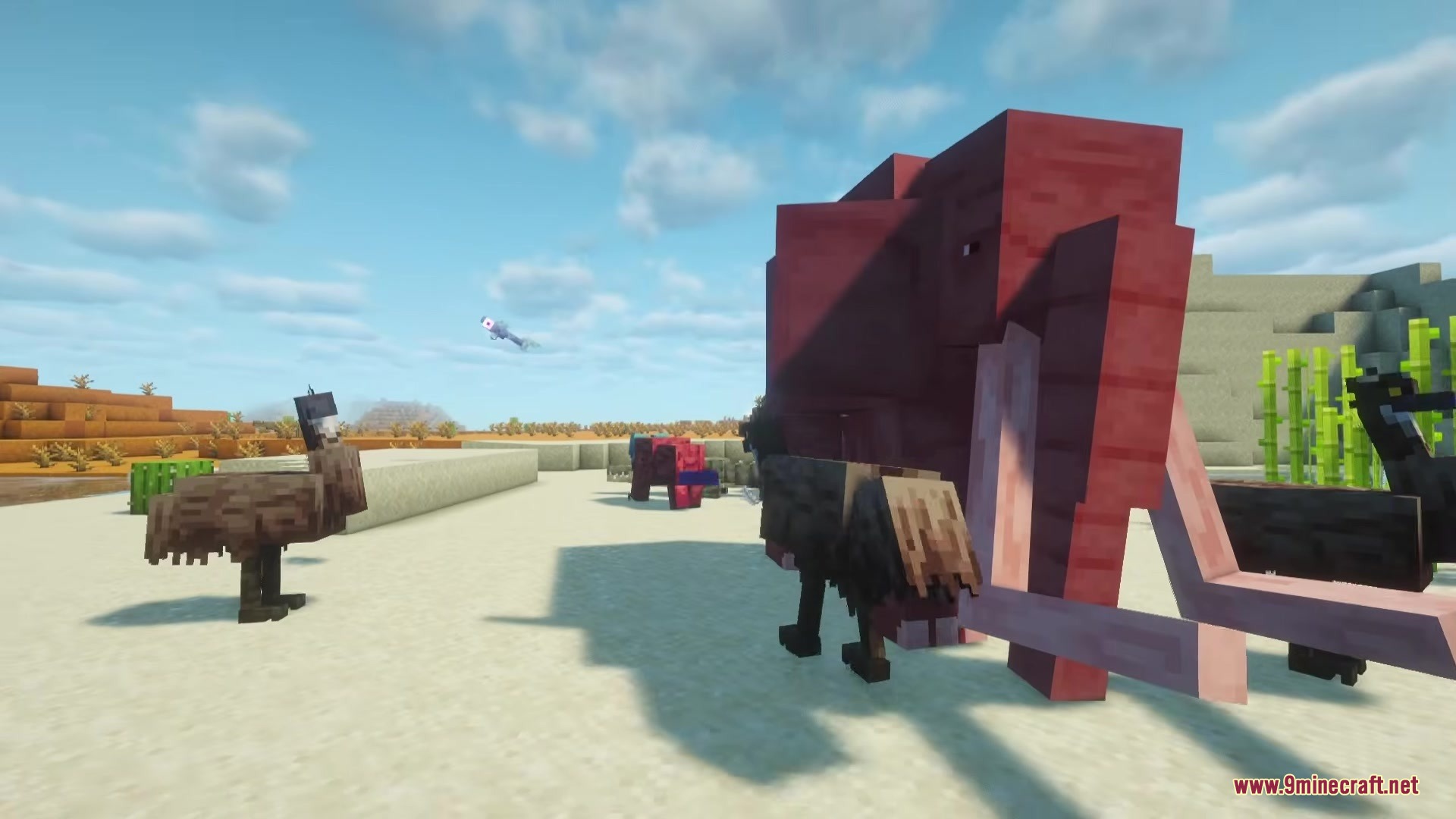 Alex’s Mobs Fabric Mod (26.2, 1.20.1) – Populate Every Biome With Exotic 9 A reddish mammoth and an emu stand on a sandy plain