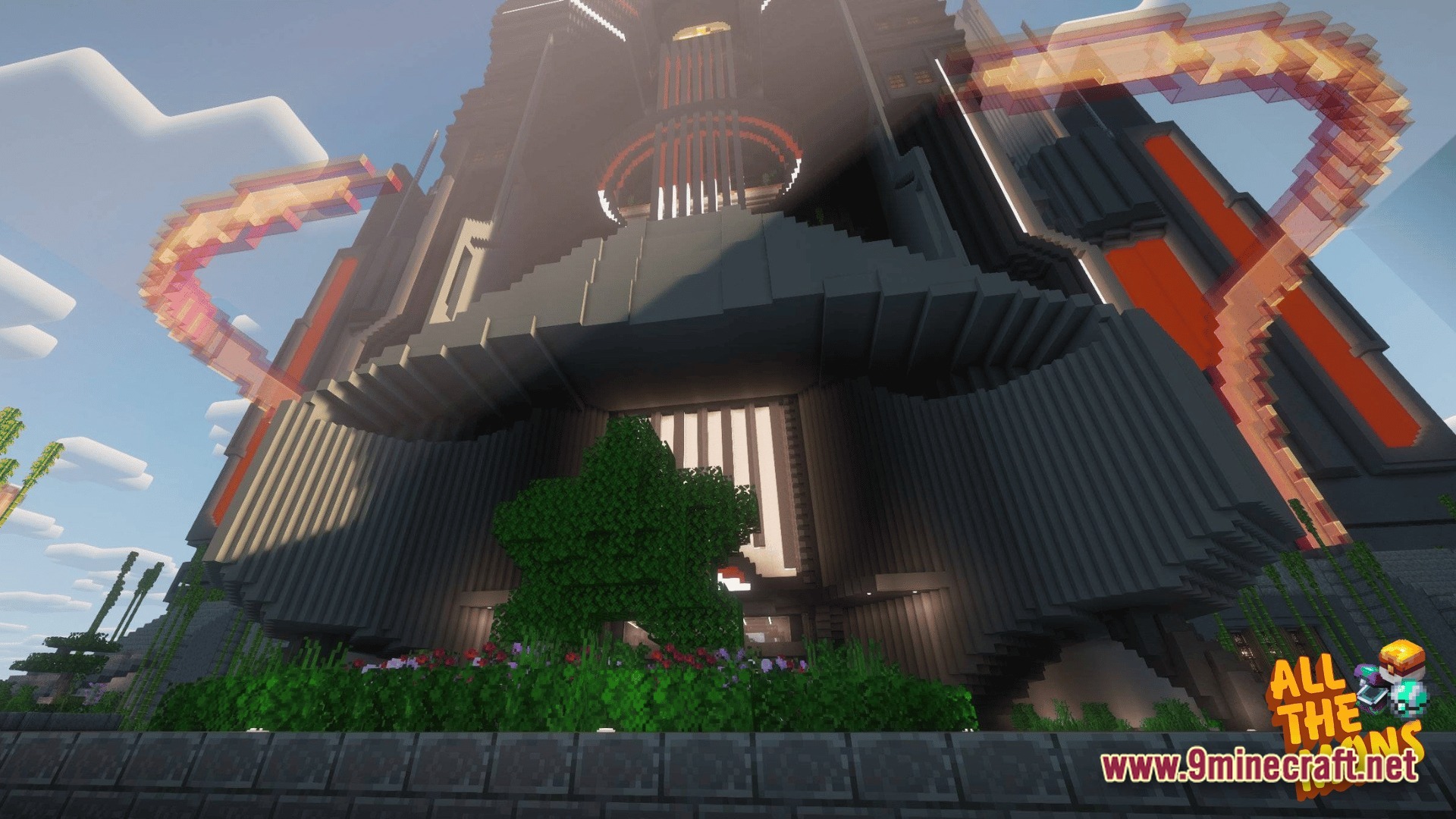 All The Mons At Mons Modpack (26.2, 1.21.1) – Catch Monsters And Build Giant 5 A massive futuristic dark-colored skyscraper featuring glowing orange accents and a garden at the base