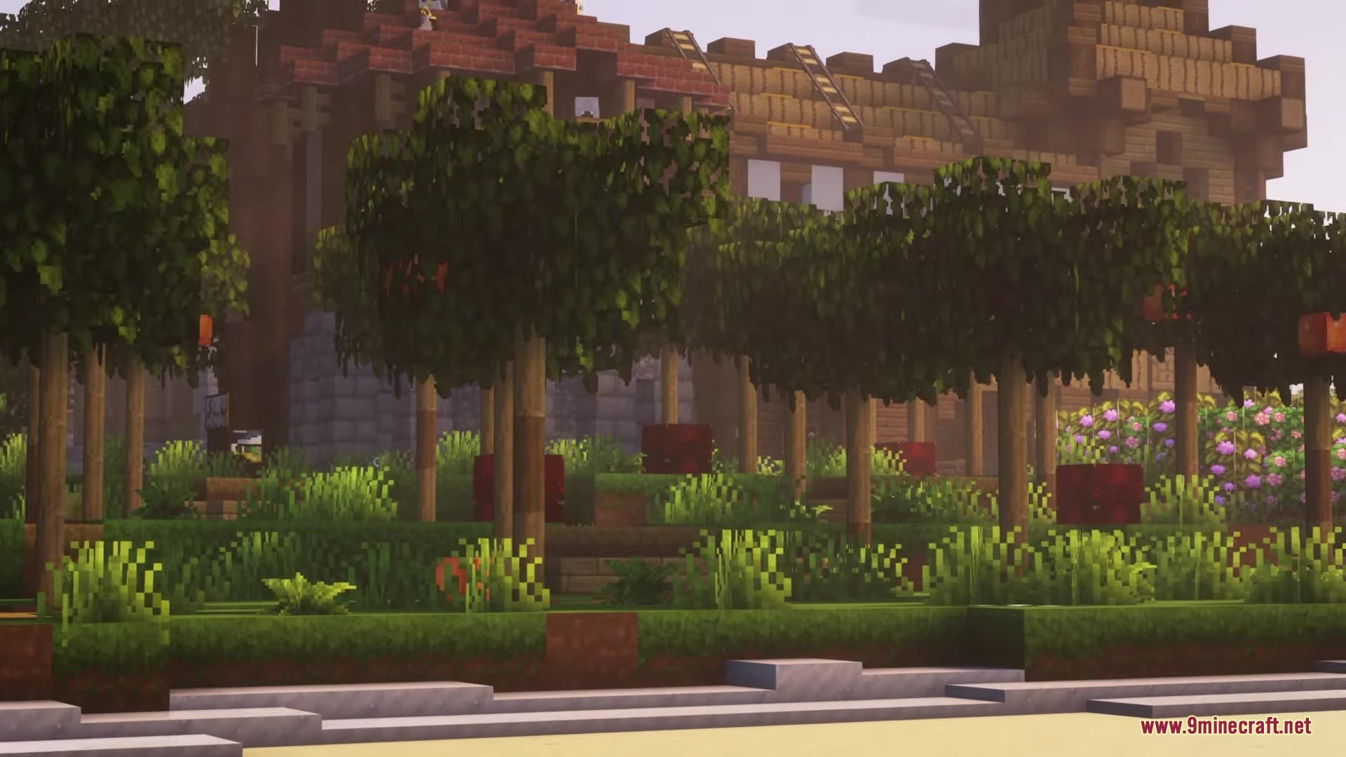 The avalon resource pack features a large wooden building and lush trees