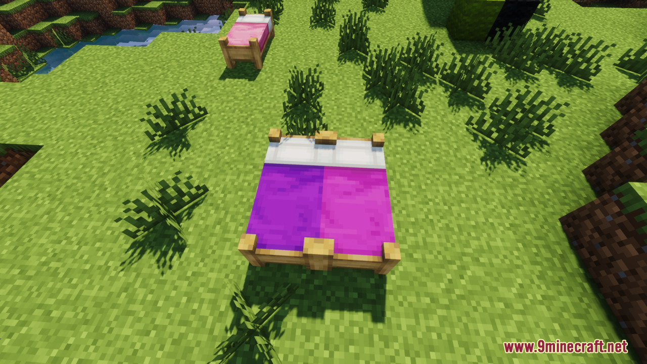 Purple and magenta double bed with a detailed wooden frame on grass