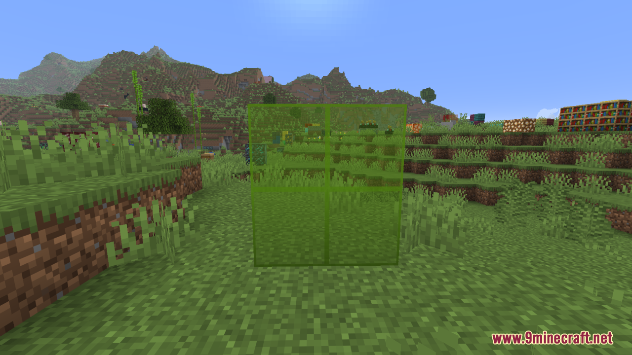 Better Clearer Glass Resource Pack (26.2, 1.21.1) – Crisp Streak-Free Windows 12 Four green stained glass blocks with clear textures in a grassy field