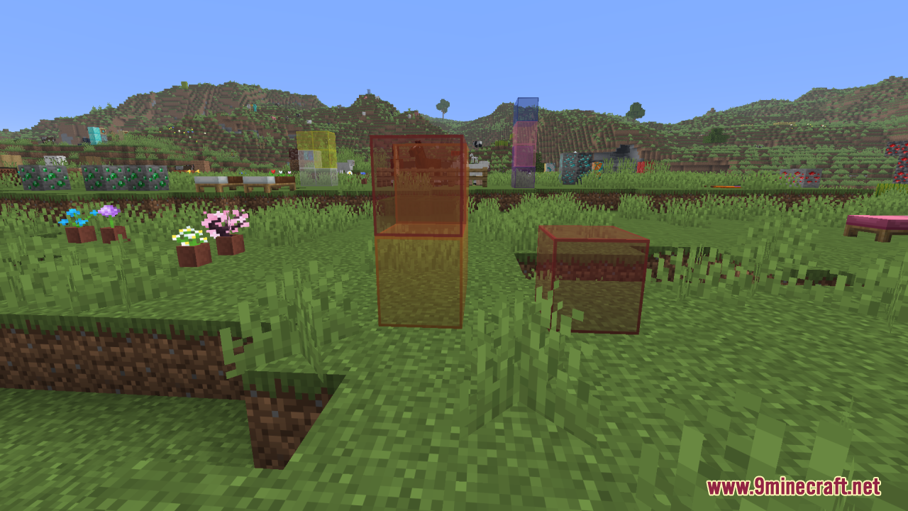 Better Clearer Glass Resource Pack (26.2, 1.21.1) – Crisp Streak-Free Windows 15 Clear red and orange stained glass blocks in a grassy minecraft field