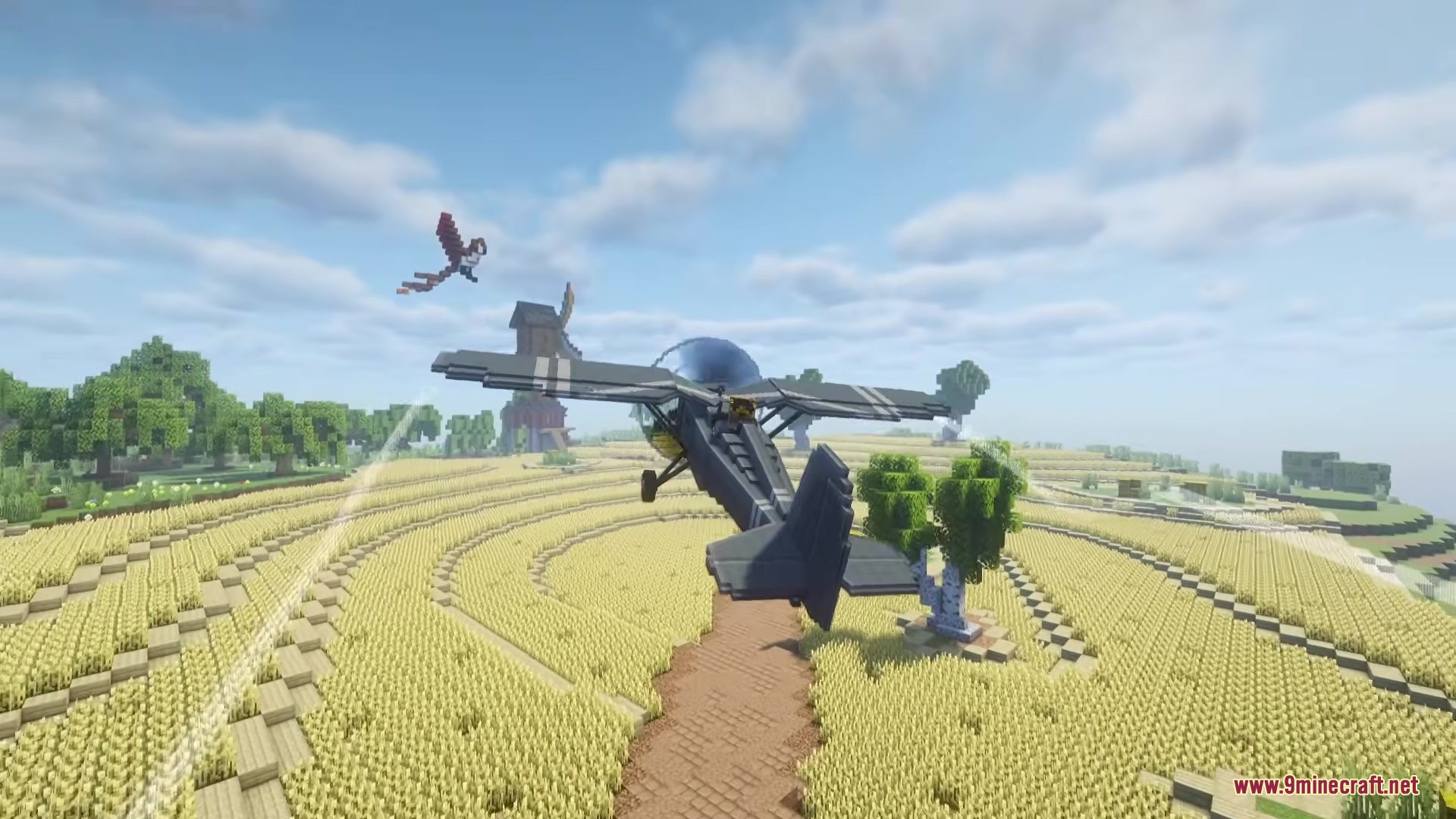 Civilian Aviation Mod (1.21.1, 1.20.1) – Pilot Modern Planes And Helicopters 6 A grey civilian plane flies over a golden wheat field with a windmill