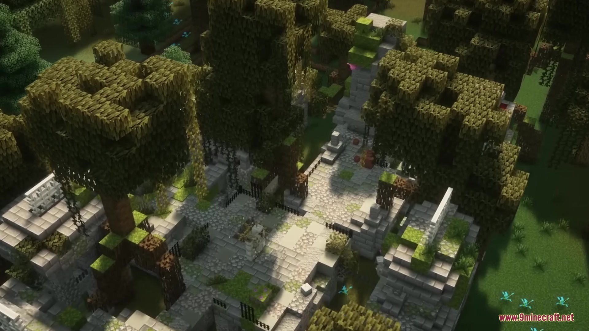 Forgotten stone ruins featuring mossy paths and fences under a forest canopy