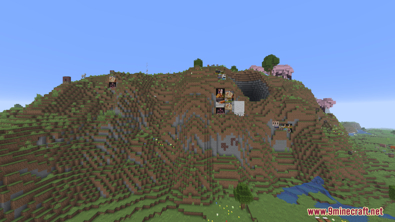Gamma Boost Resource Pack (1.21.11, 1.21.1) – Brighter Nights And Clearer Caves 9 A large hill with paintings on the side and pink cherry blossom trees
