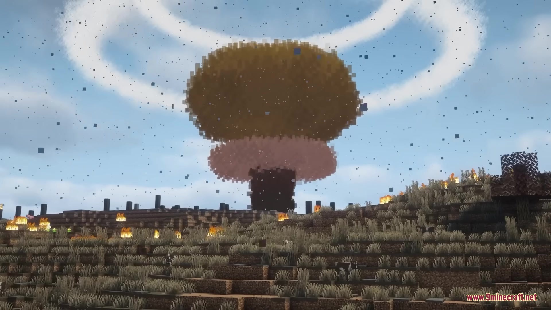 Hbm Ntm Rebirth Mod (1.20.1) – Build Nuclear Reactors And Detonate Massive Bombs 2 A giant mushroom cloud rises from a nuclear explosion in a minecraft world