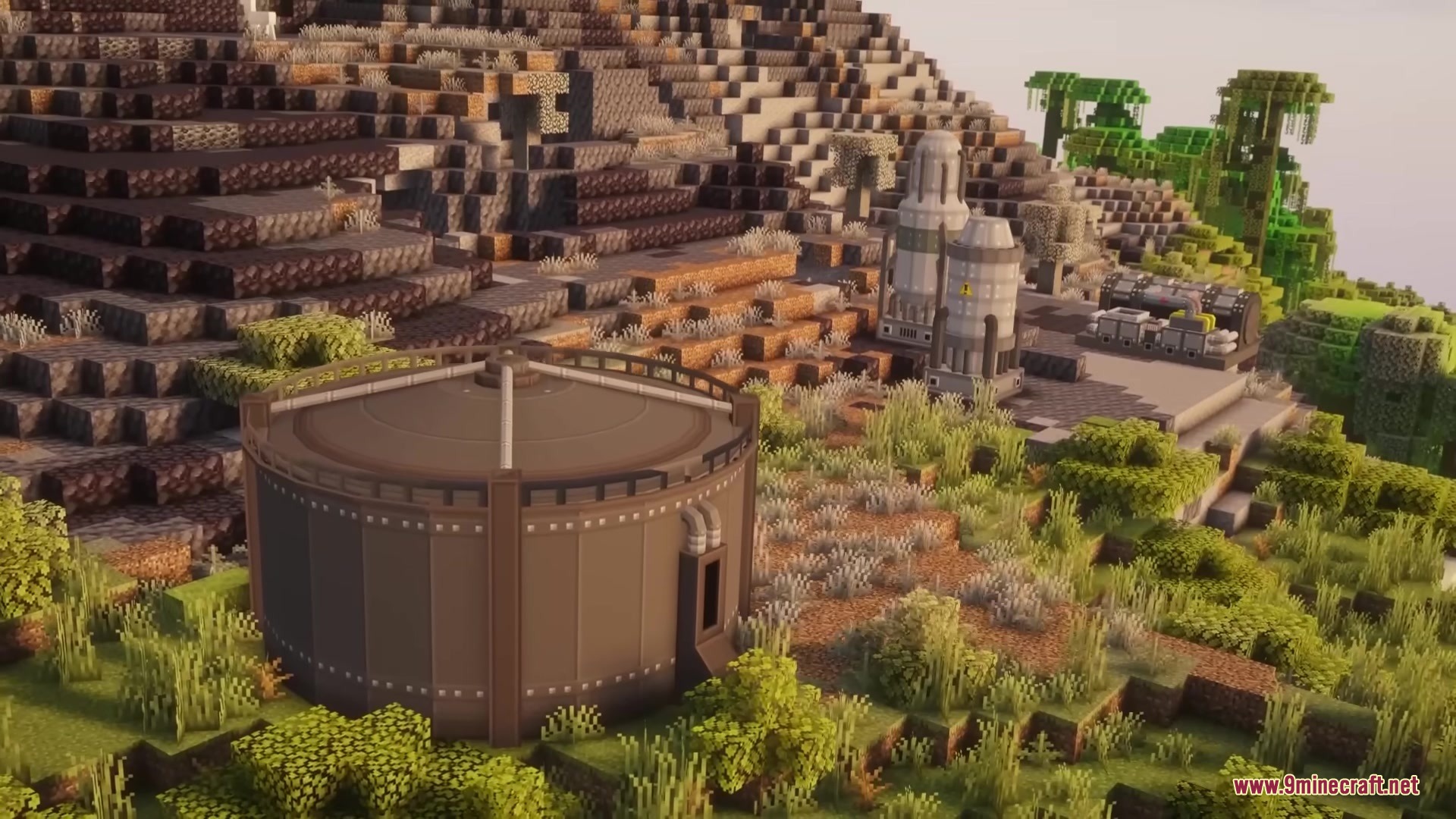 Hbm Ntm Rebirth Mod (1.20.1) – Build Nuclear Reactors And Detonate Massive Bombs 13 Large industrial storage tanks and silos built on a hillside in minecraft