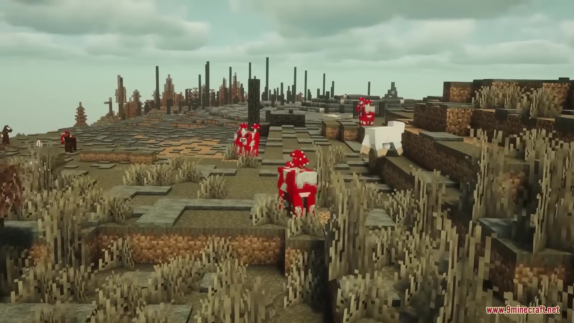 Hbm Ntm Rebirth Mod (1.20.1) – Build Nuclear Reactors And Detonate Massive Bombs 10 Mooshrooms wandering through a desolate landscape with tall black pillars and dead bushes