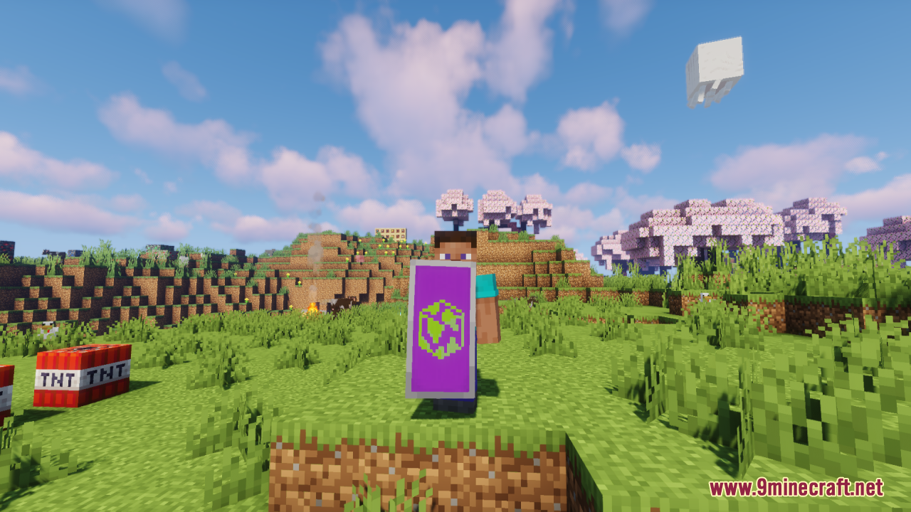 Hd Shield Resource Pack (26.1.2, 1.20.1) – Crystal Clear Custom Shield Banners 4 A minecraft player holding a purple shield with a green globe pattern
