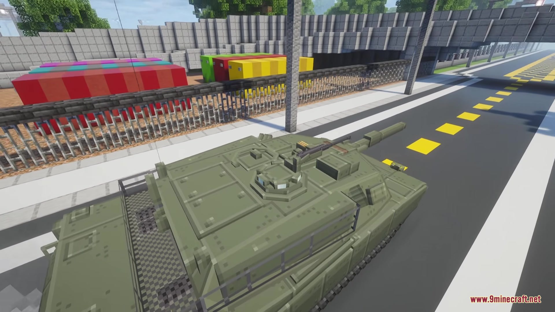 Iv Mts P Wic Project World In Conflict Mod (26.1.2, 1.20.1) 2 A green military tank parked on a road next to a metal fence