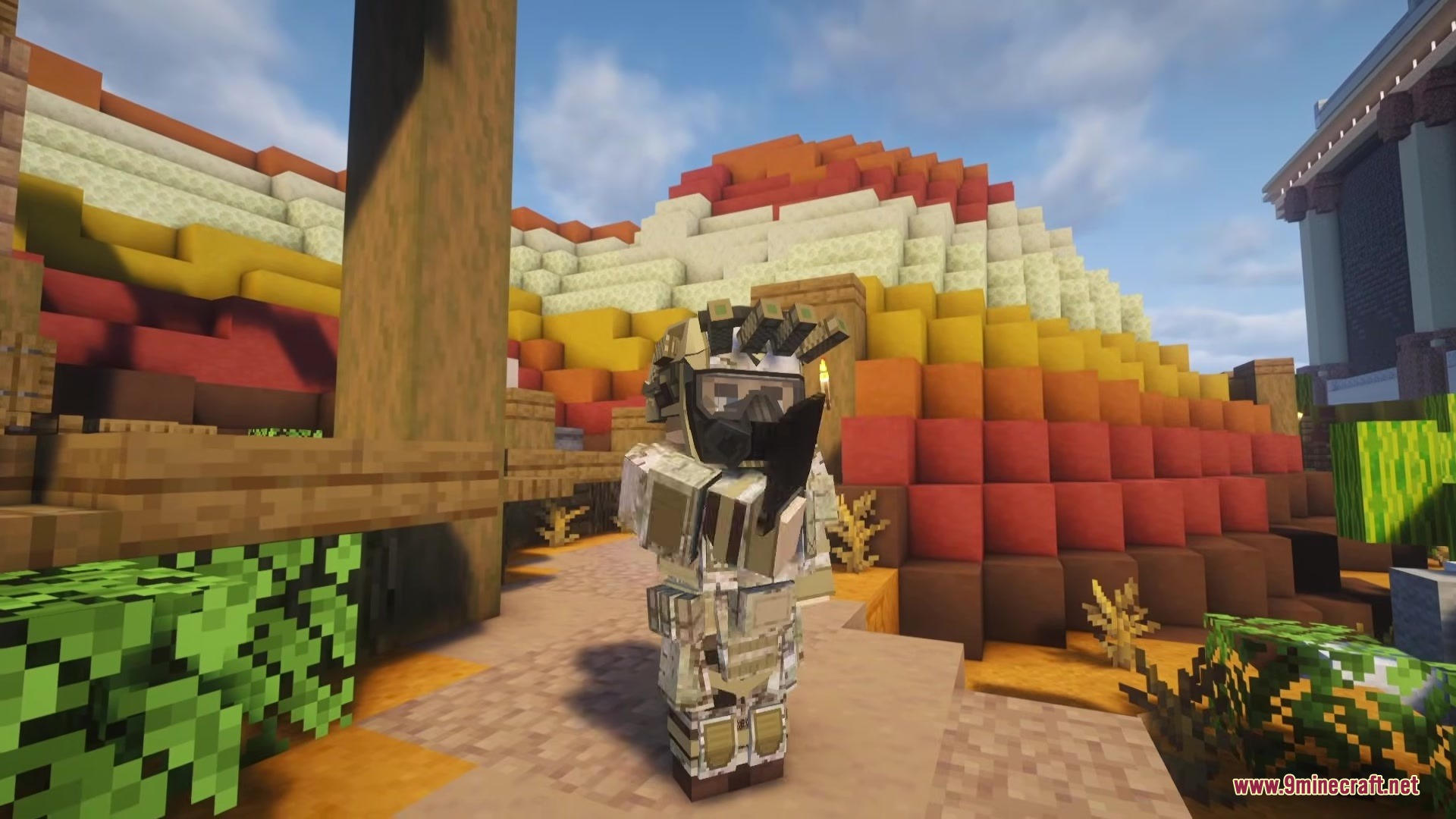 Iv Mts P Wic Project World In Conflict Mod (26.1.2, 1.20.1) 12 A minecraft player wearing detailed military gear stands in a colorful desert landscape