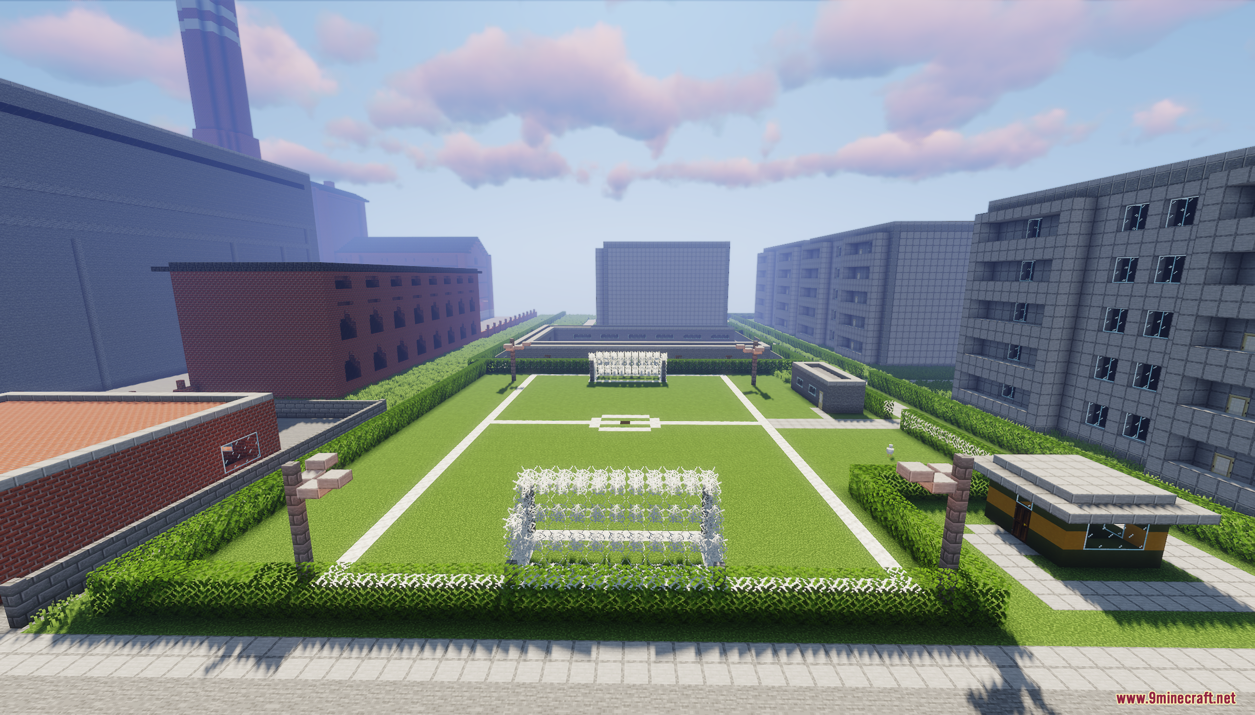 Jaworowiec City 1988 Map (26.2, 1.20.1) – Eastern European Town 8 A green soccer field surrounded by apartment buildings in a minecraft city
