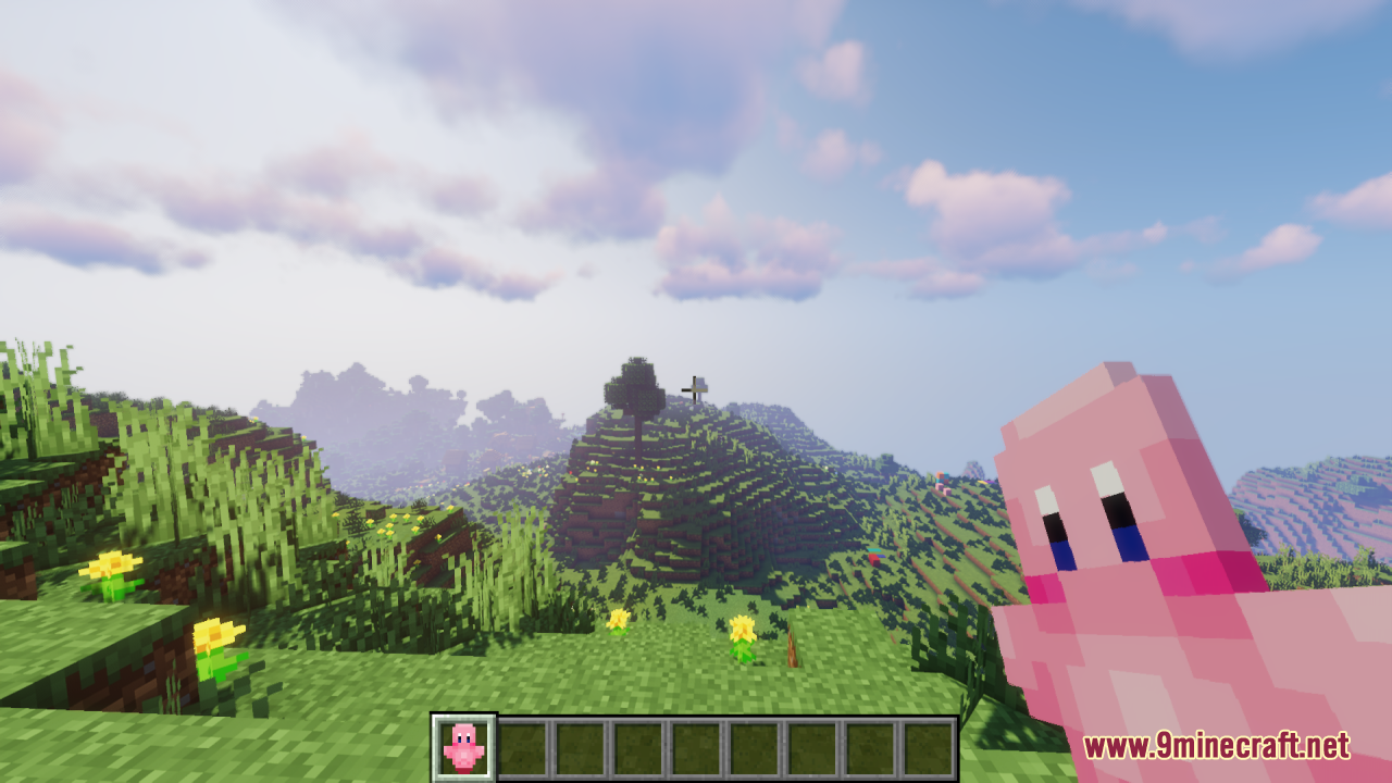 Kirby Totem Of Undying Resource Pack (1.21.11, 1.21.1) – Lovely Figure Into Your Game 3 Player holding a pink kirby totem of undying while looking at a hill