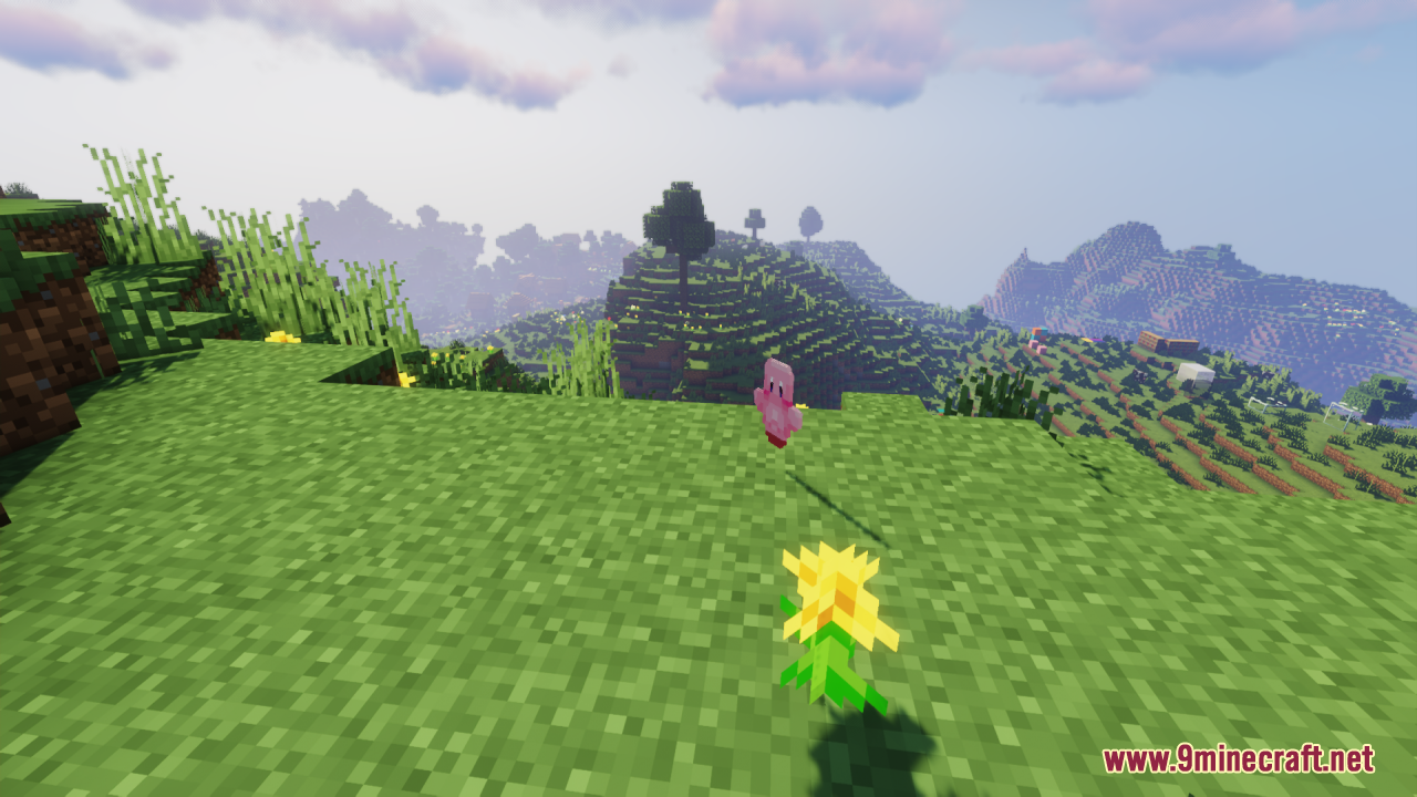 Kirby Totem Of Undying Resource Pack (1.21.11, 1.21.1) – Lovely Figure Into Your Game 4 A pink kirby figure floats above a grassy hill in a minecraft world