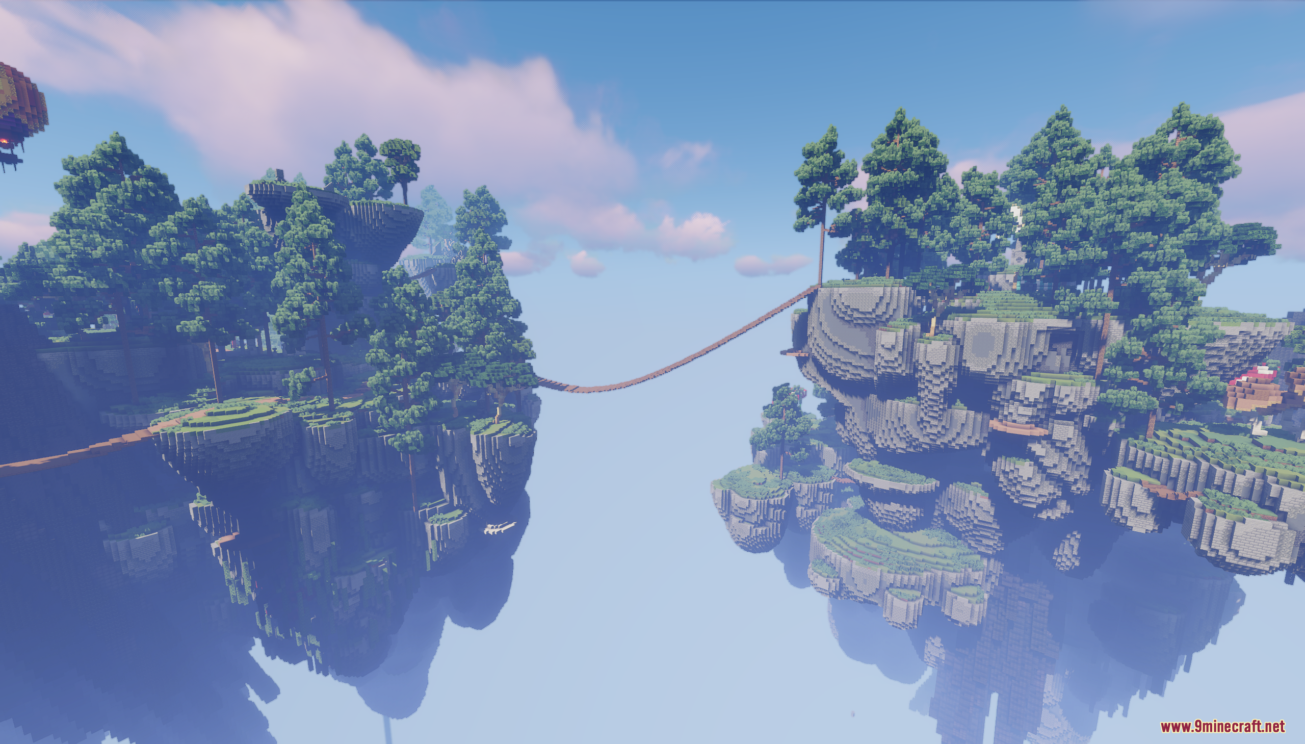 A long rope bridge connecting two large floating islands in the sky