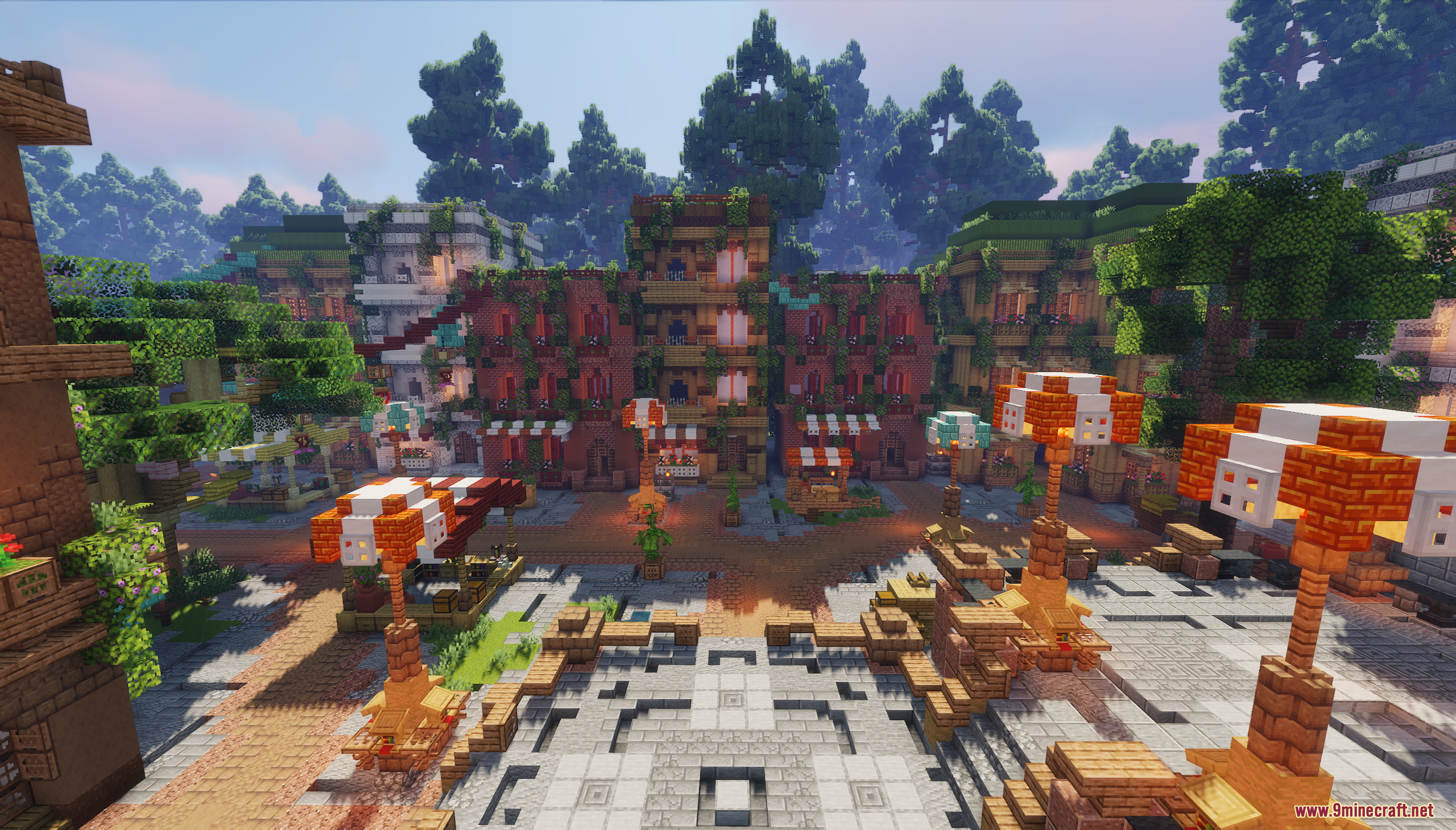 Market stalls with orange umbrellas located in the central village plaza