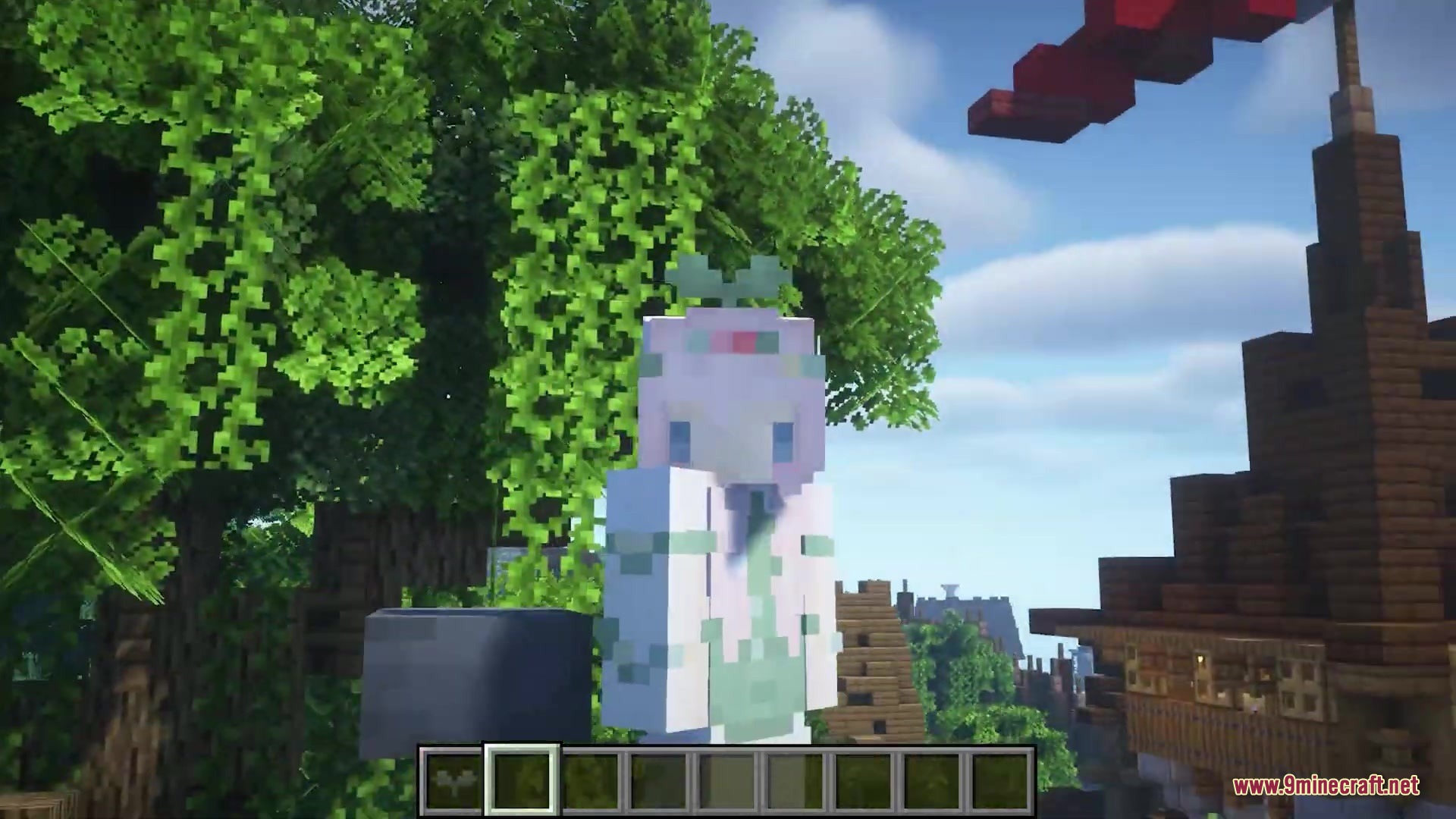 Sprout Hat Resource Pack (1.21.11, 1.20.1) – Wear A Cute Tiny Green Plant 4 A minecraft character wearing a small green sprout hat near a wooden building