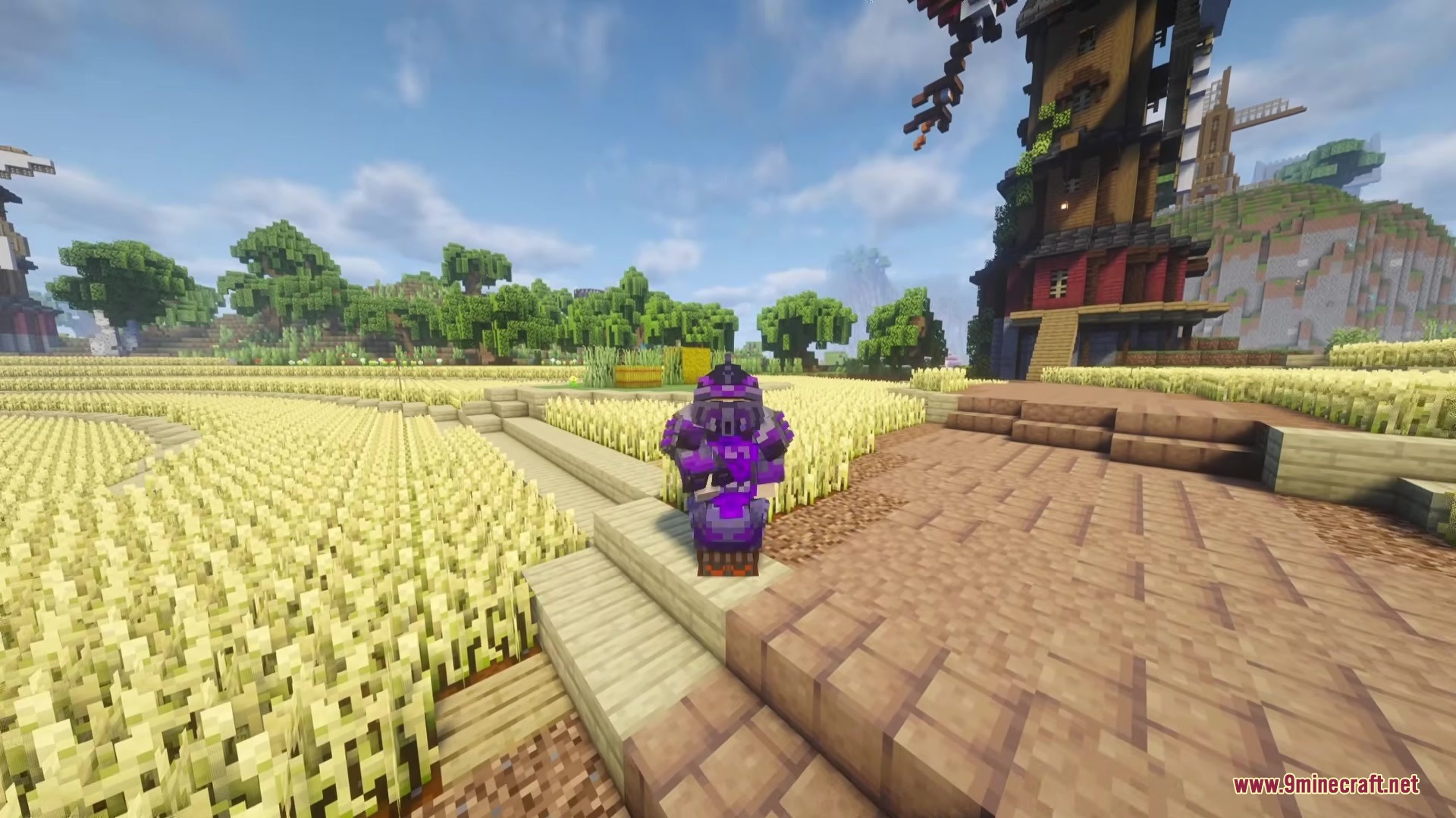 Tacz More Level Mod (1.20.1) – Fight Armed Enemies With Tiered Tactical Gear 8 Player in purple tactical armor standing in a golden wheat field