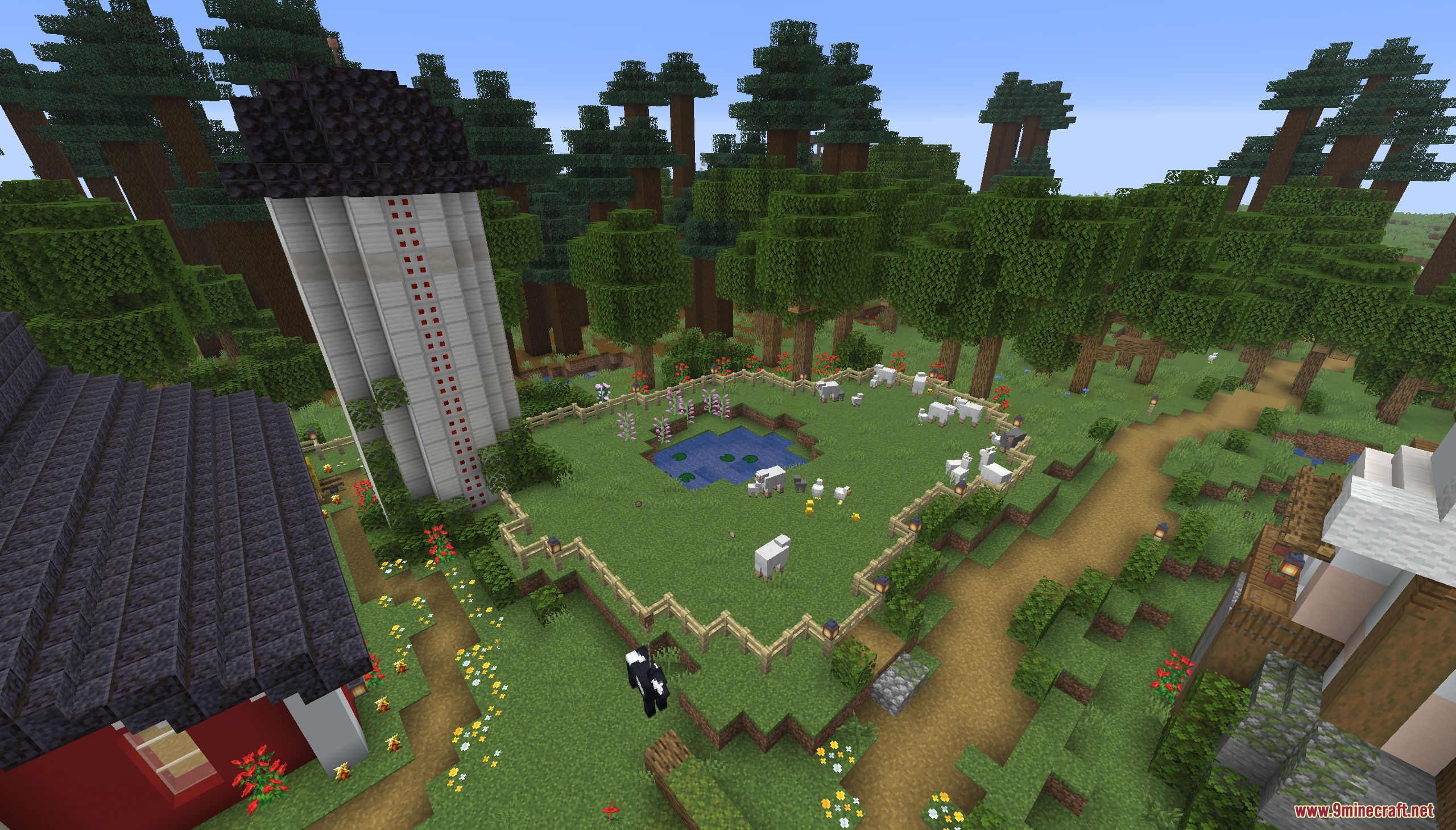 Tiny Takeover Farmstead Map (26.2, 1.20.1) – Peaceful Farm Life 7 A tall silo and a fenced animal pen with sheep on a farm