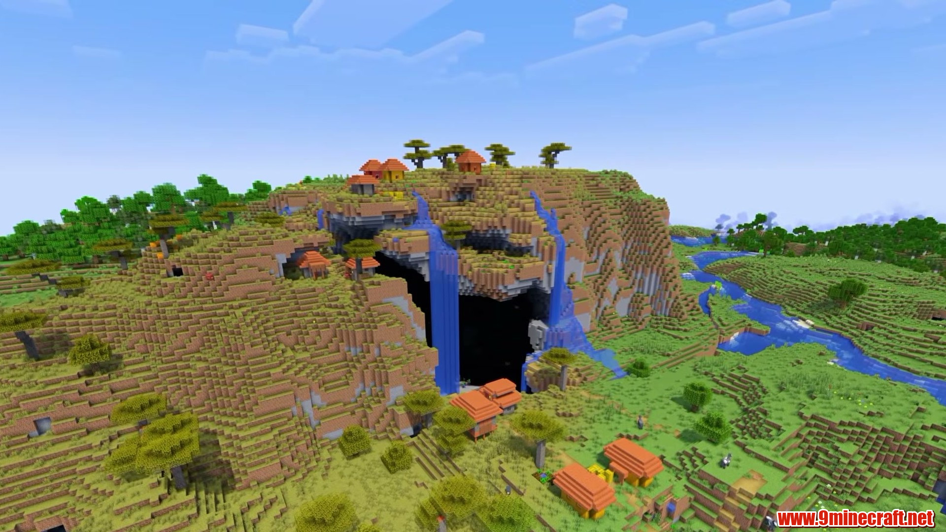 Top 15 Village Seeds For Your Next Minecraft World (26.2, 1.21.11) – Java Edition 2 Village in front of a huge cave arch in minecraft seed 225237899