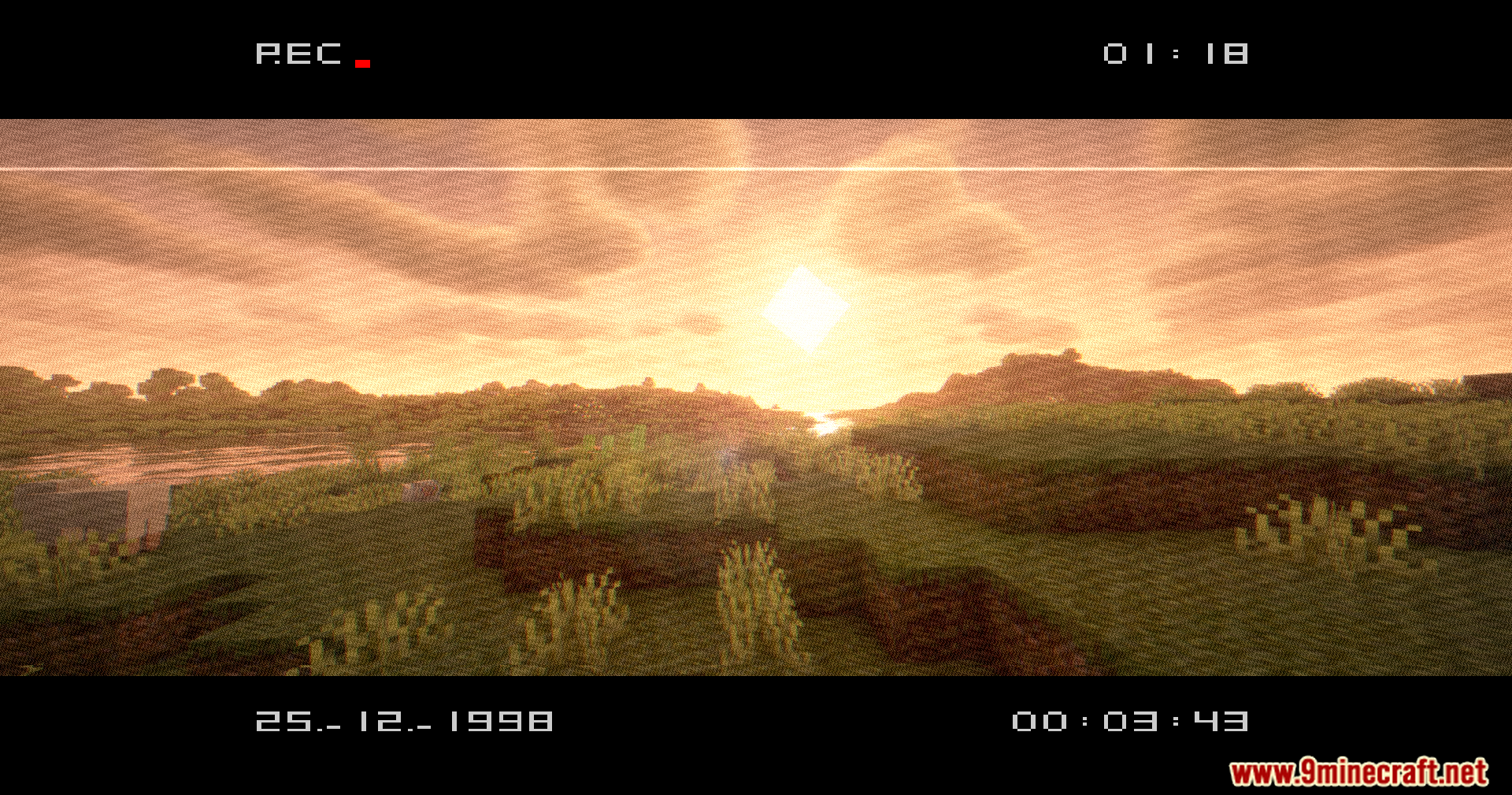 Vhs X Bsl Shaders (1.20.1) – Analog Noise And Vhs Tape Distortion 3 Grassy minecraft hills under a bright sun with a retro found footage filter