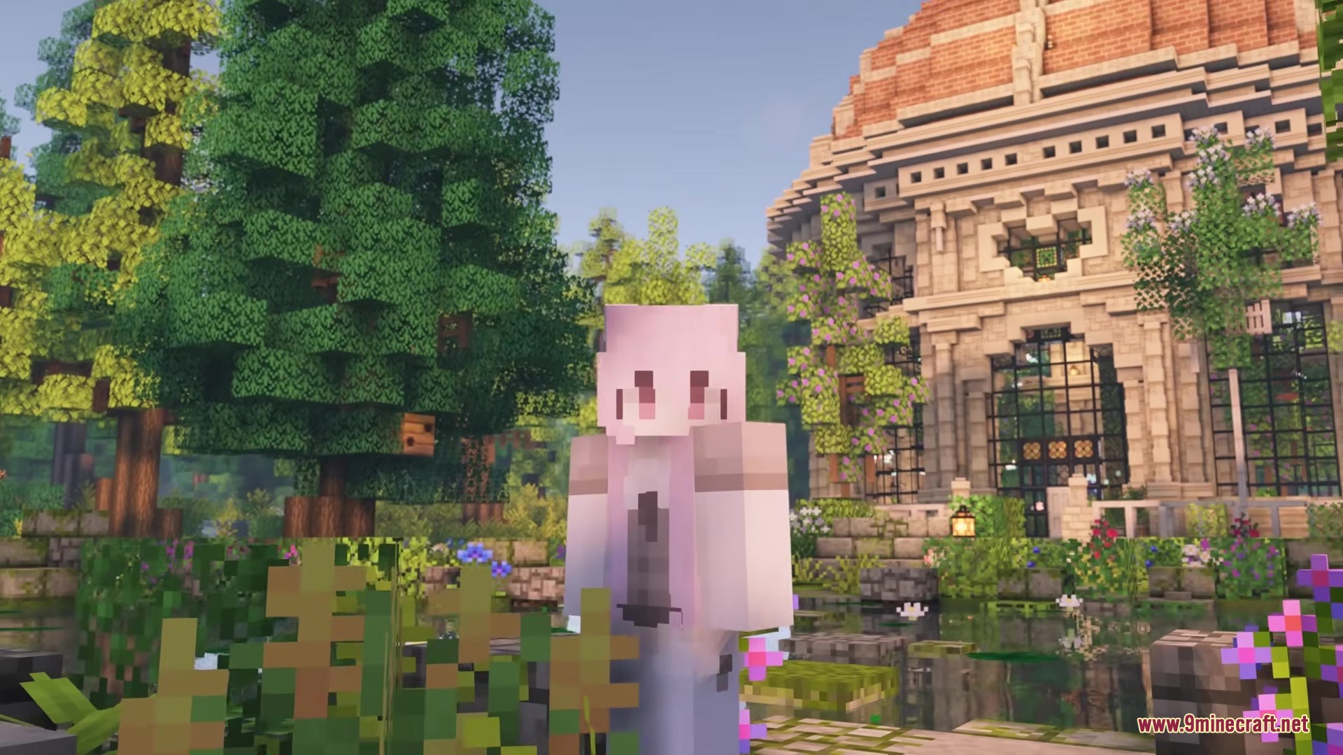 A minecraft player character standing in front of a large garden building