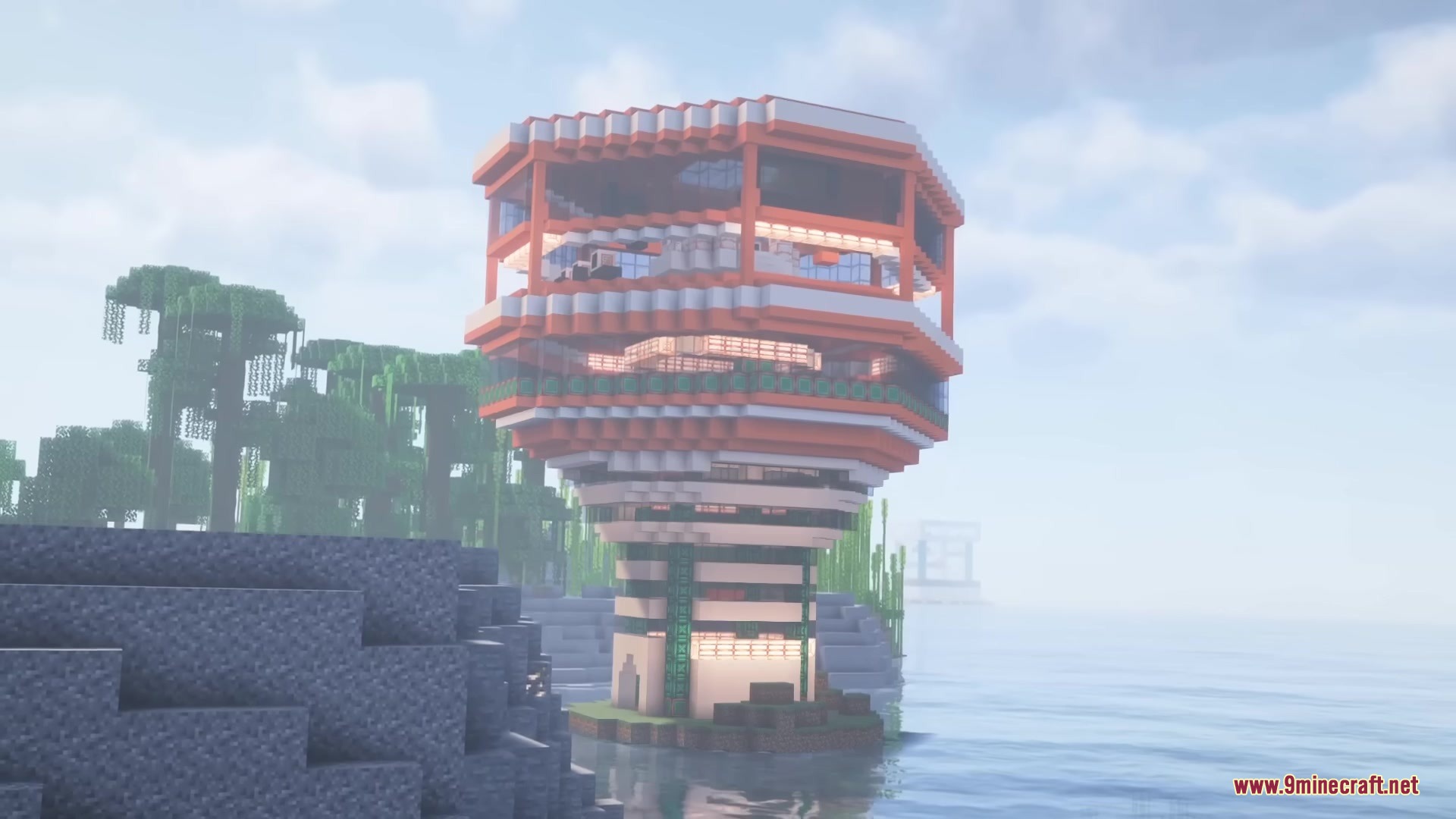 Large orange and white sci-fi tower standing tall near a jungle biome
