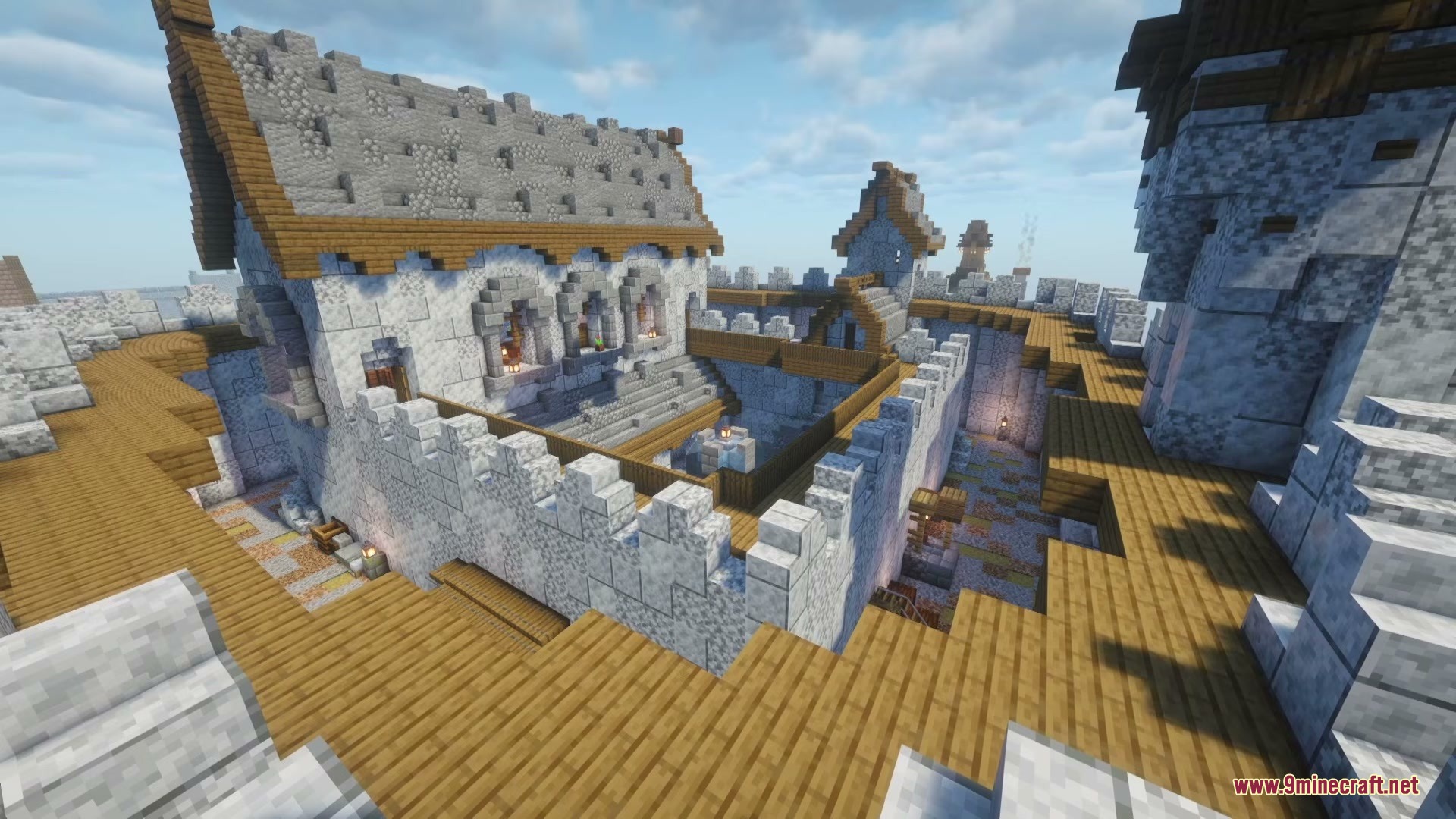 A Game Of Blocks Mod (1.21.1) – Rule Your Own Medieval Kingdom 5 A massive medieval castle courtyard with stone walls and wooden walkways
