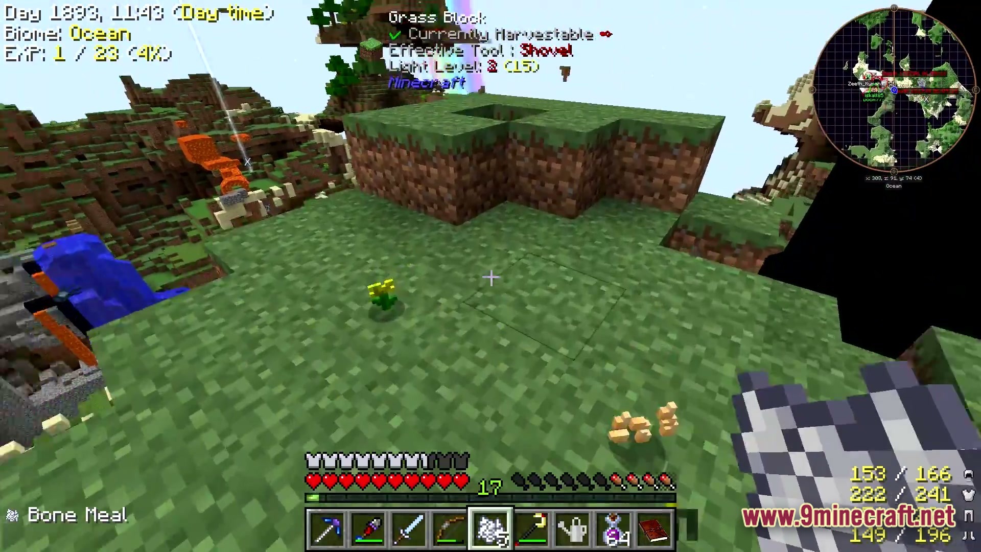 A player holds bone meal while standing on a floating grass island with various hud overlays