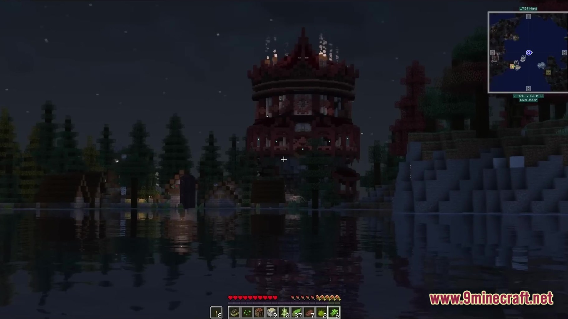 All The Mods 9 Atm9 Modpack (26.2, 1.20.1) – Craft The Ultimate Star 2 A large red circular tower structure stands beside a lake at night in a forested biome