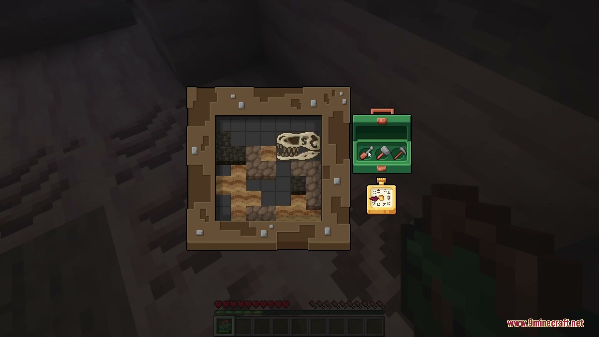 Anachronistic Wilds Mod (1.20.1) – Summon And Breed Extinct Prehistoric Wildlife 3 An interface for the fossil excavation minigame showing a dinosaur skull and tools