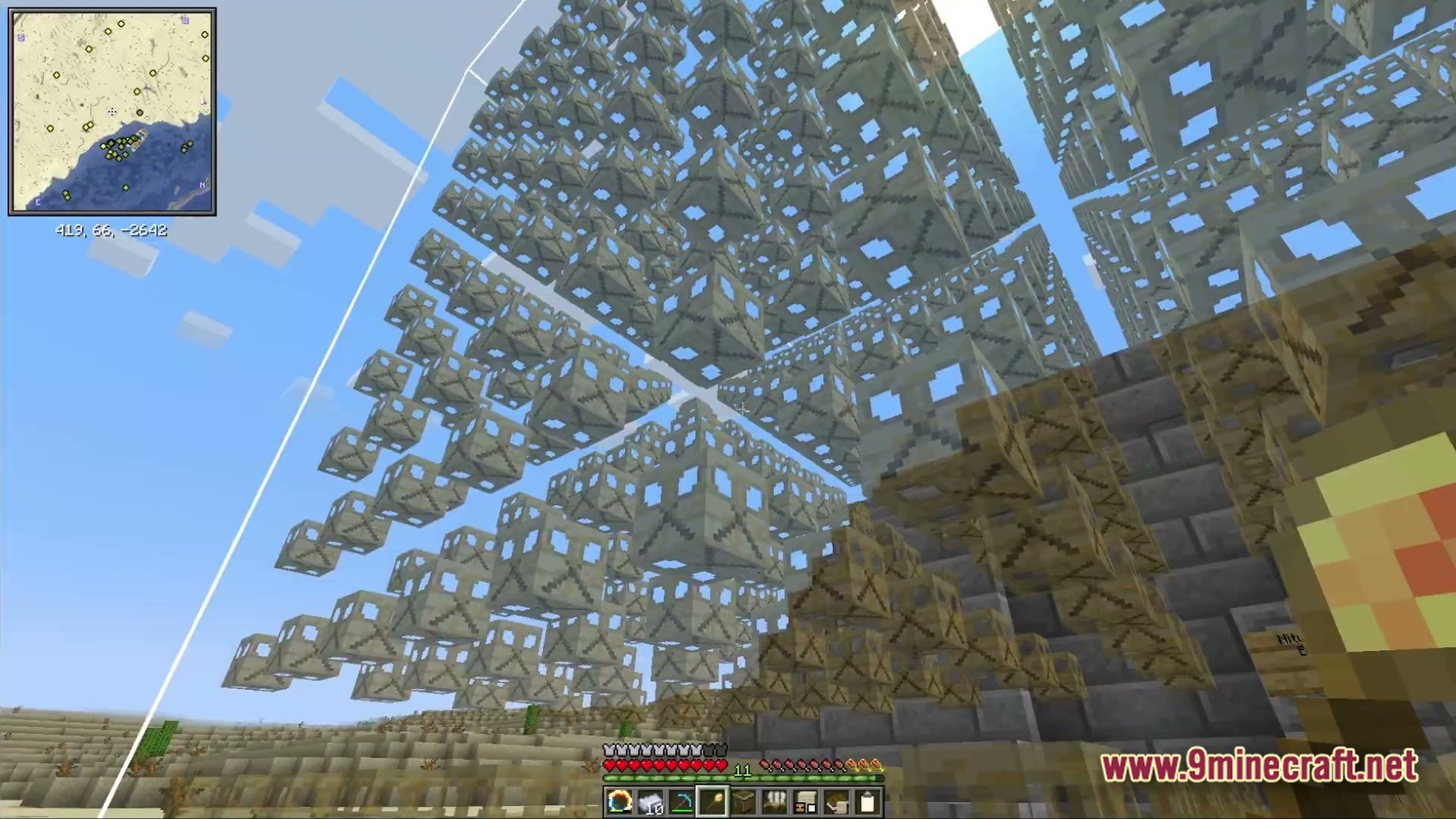 Ancient Kingdoms 3 Modpack (1.20.1) – Build Kingdoms Master Magic Slay 5 A massive fractal structure composed of repeating geometric blocks floating above a desert biome